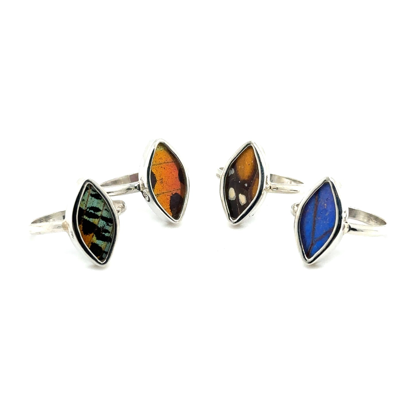 A set of Genuine Butterfly Wing Rings in Marquise Shape with different colored stones, embodying sustainable fashion and conservation.