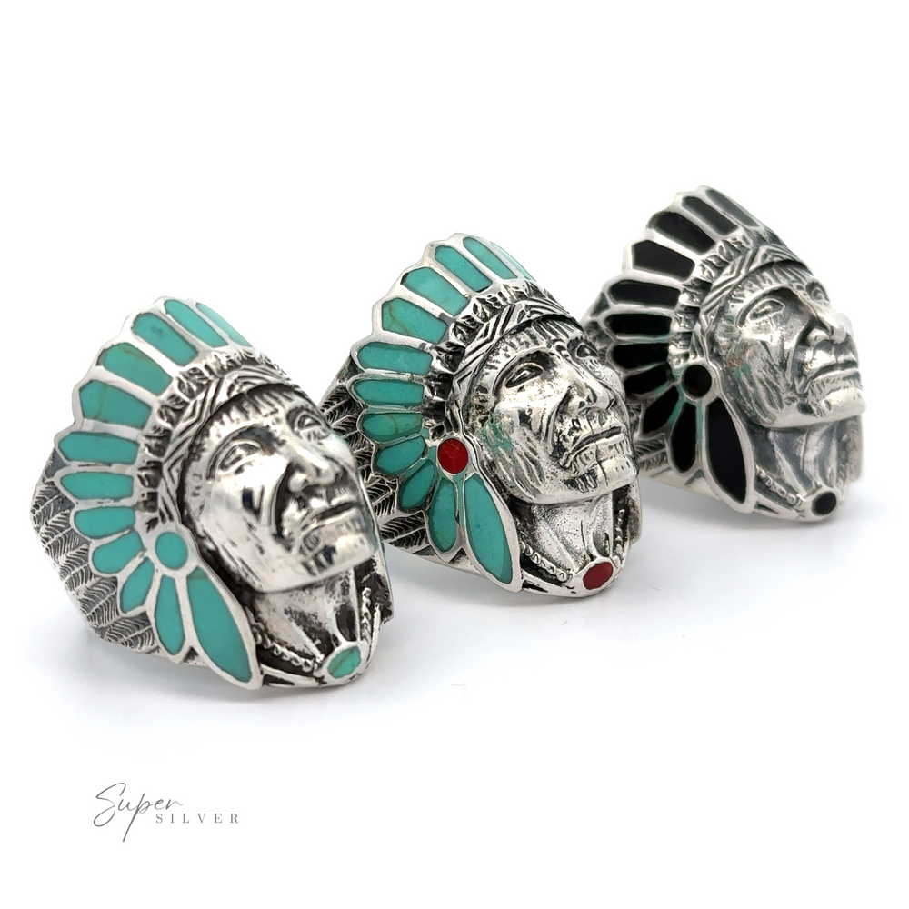 Three silver Stately Chief Head rings with turquoise stones in a traditional design.
