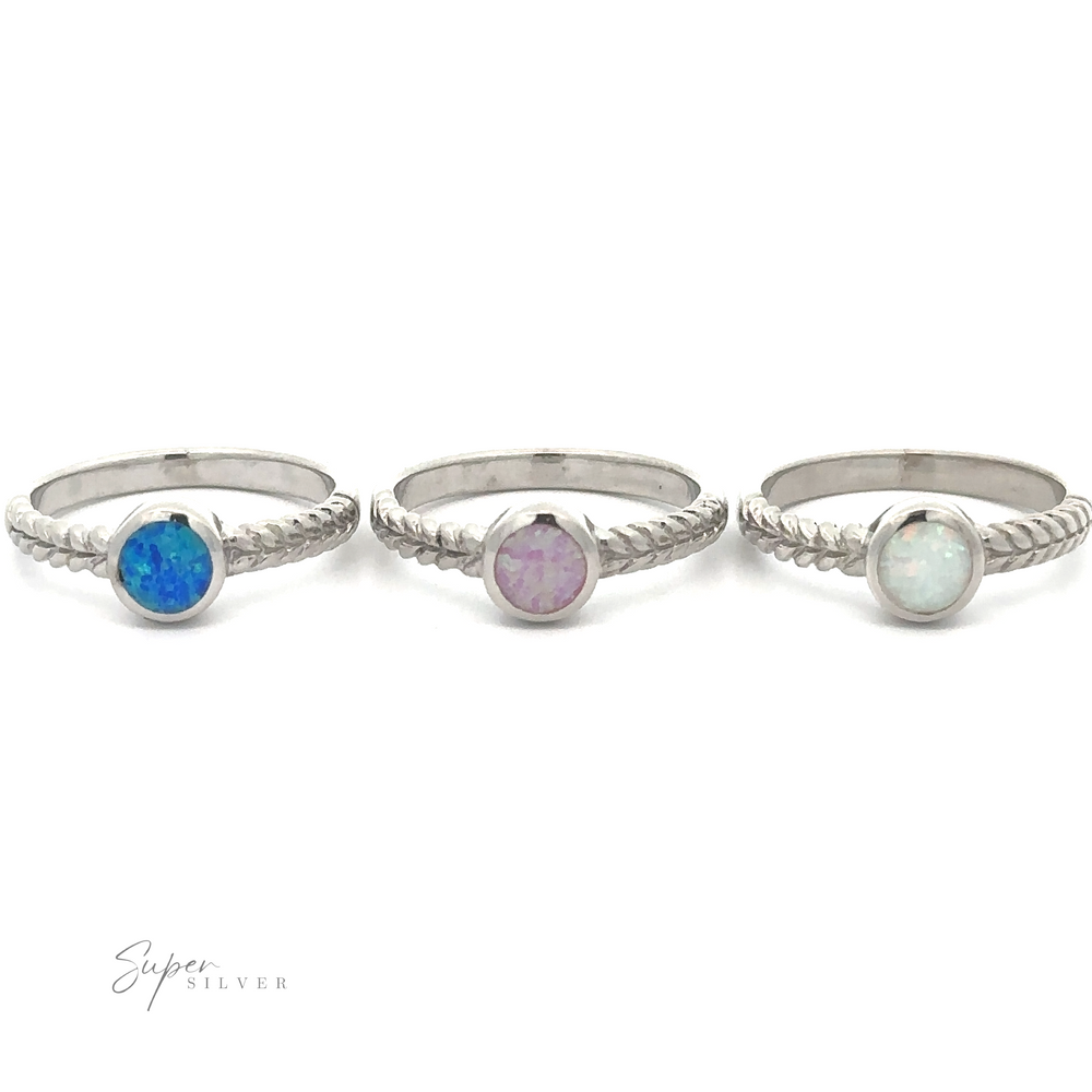 
                  
                    Three Half Braided Bands with Round Opal gemstones displayed in a row on a white background.
                  
                
