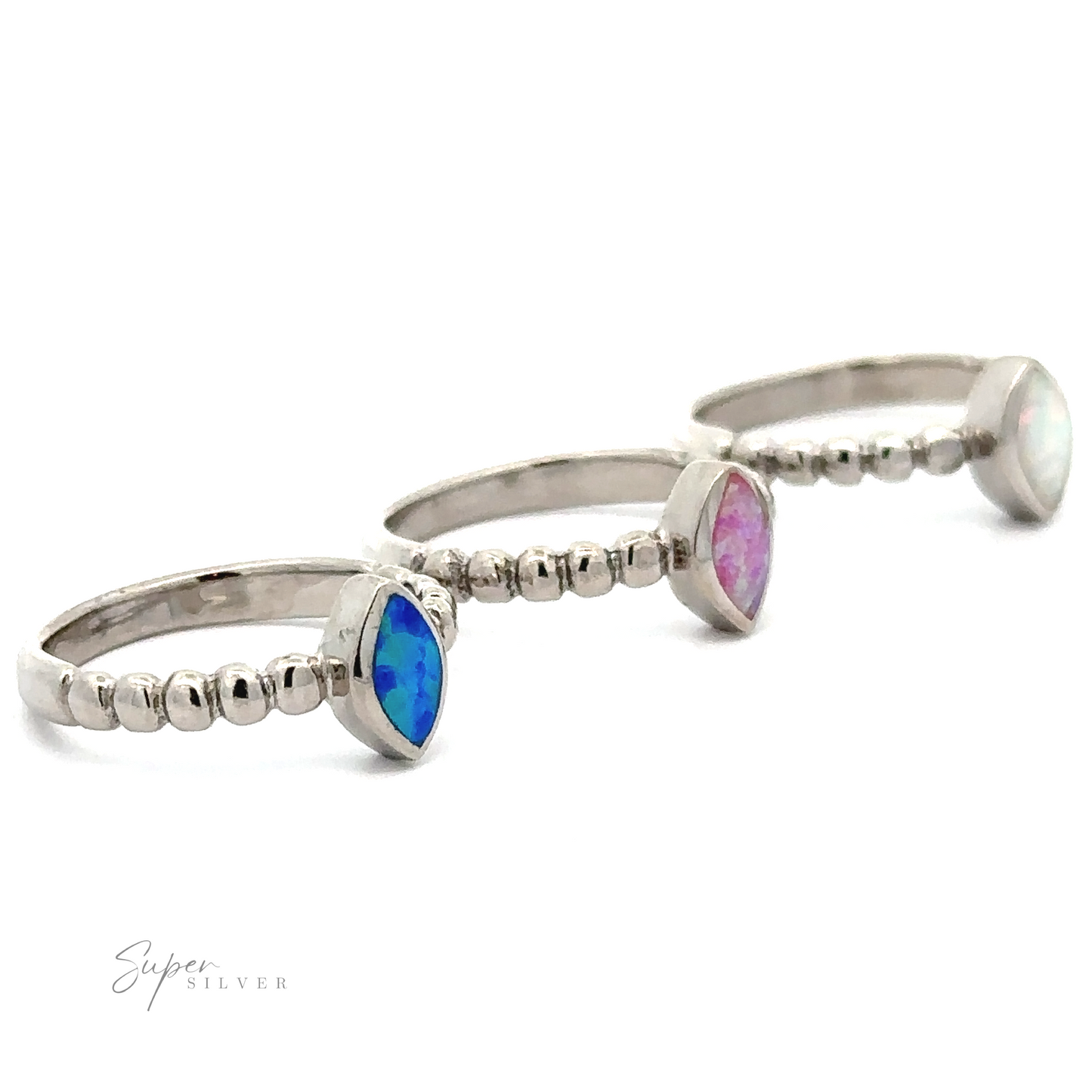 Three Marquise Lab-Created Opal Rings with Beaded Design, displayed on a white background, featuring minimalist ring designs.