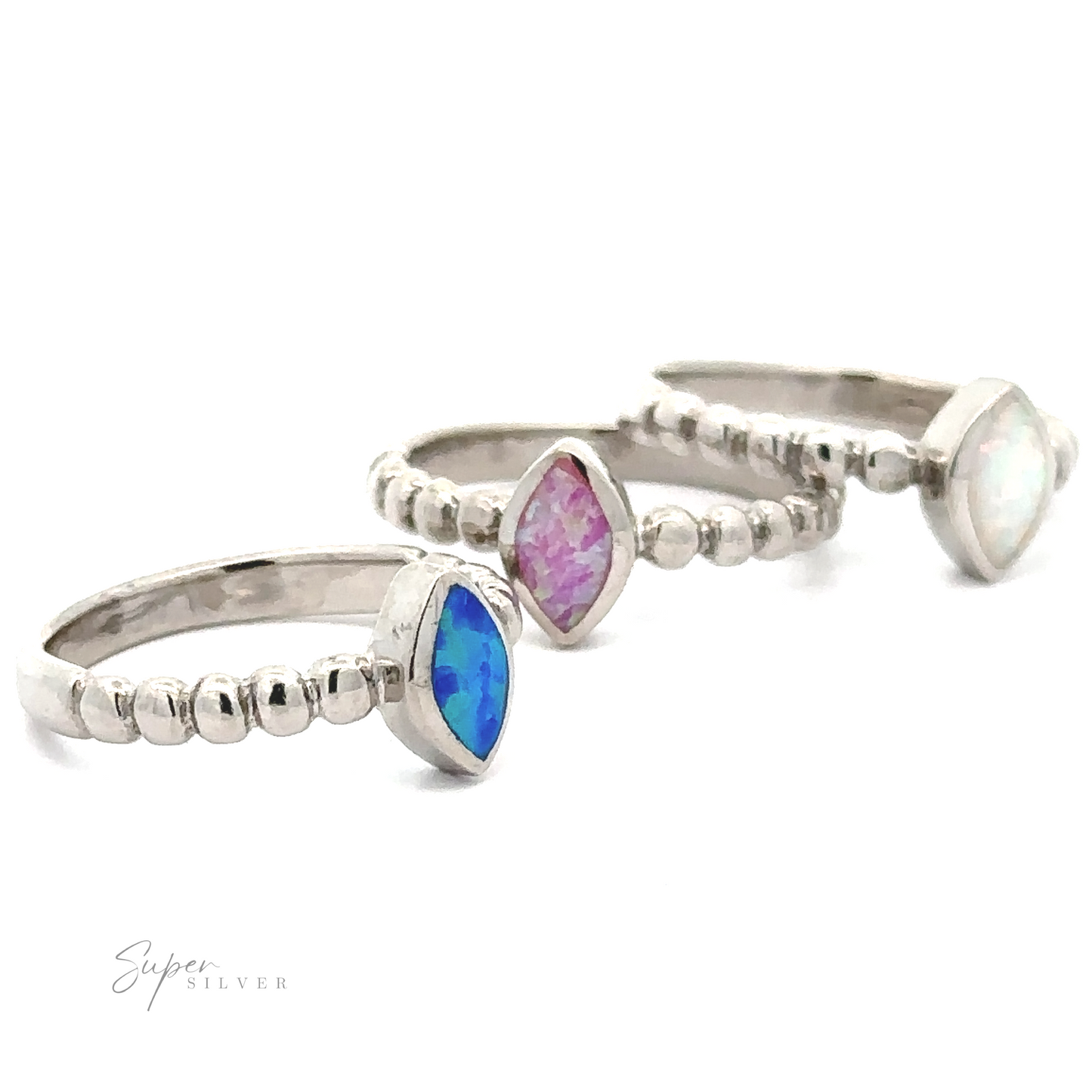 Three Marquise Lab-Created Opal Rings with Beaded Design, each featuring a marquise-shaped, lab-created opal in different hues of blue, pink, and white.