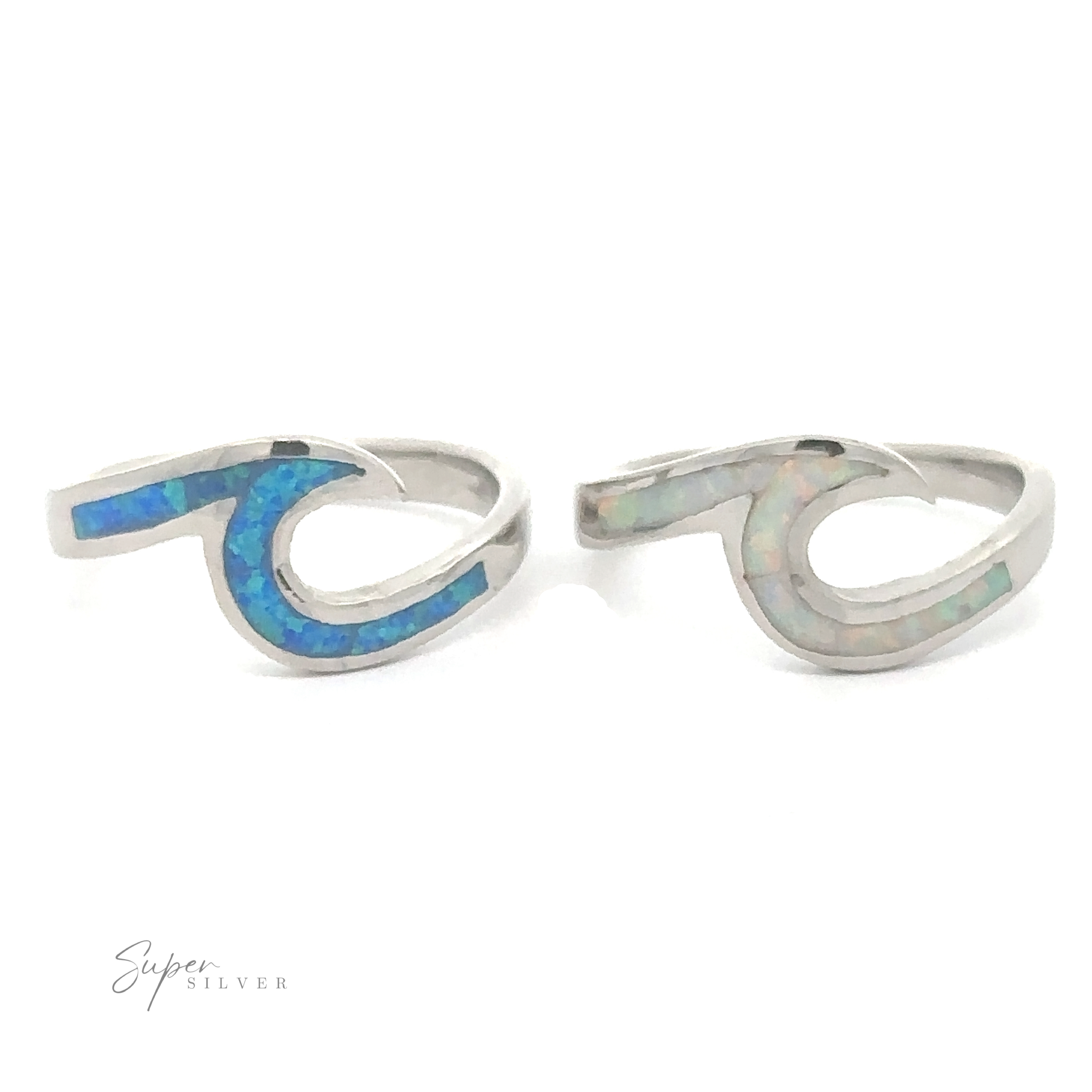A pair of silver Wave Rings with Sparkling Inlaid Lab-Opals forming an ocean wave design.