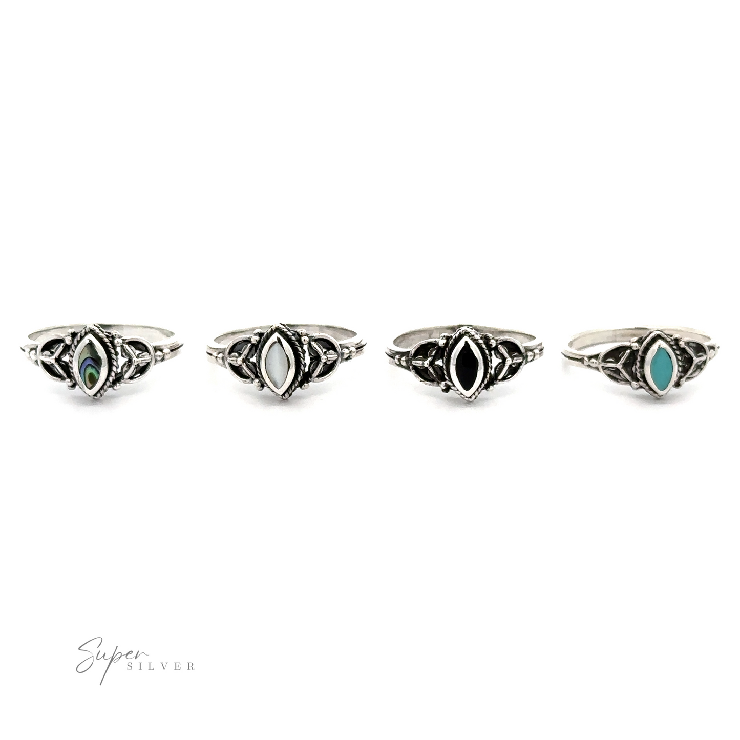 A set of four fashionable Tiny Marquise Inlay Stone Rings with a vintage look and featuring turquoise stones.
