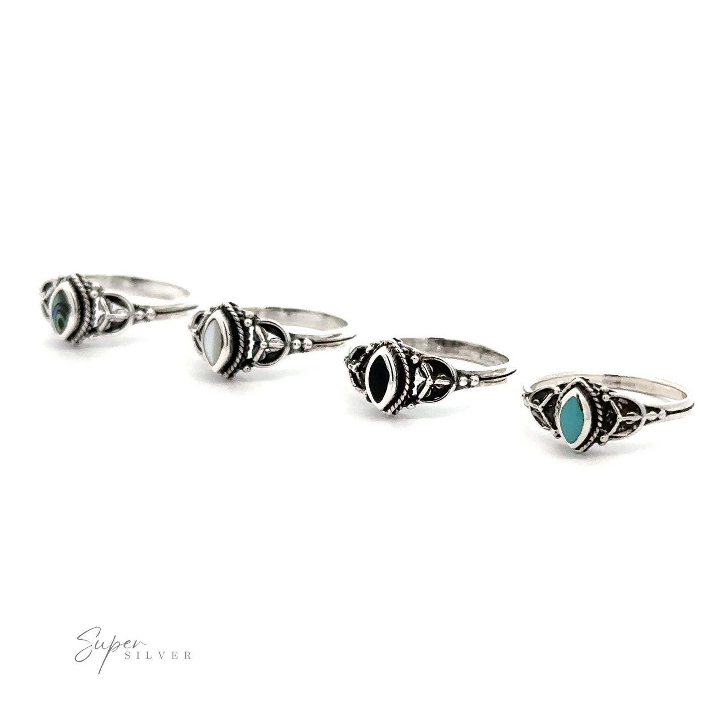 Four fashionable Tiny Marquise Inlay Stone rings with vintage turquoise stones on a white background.