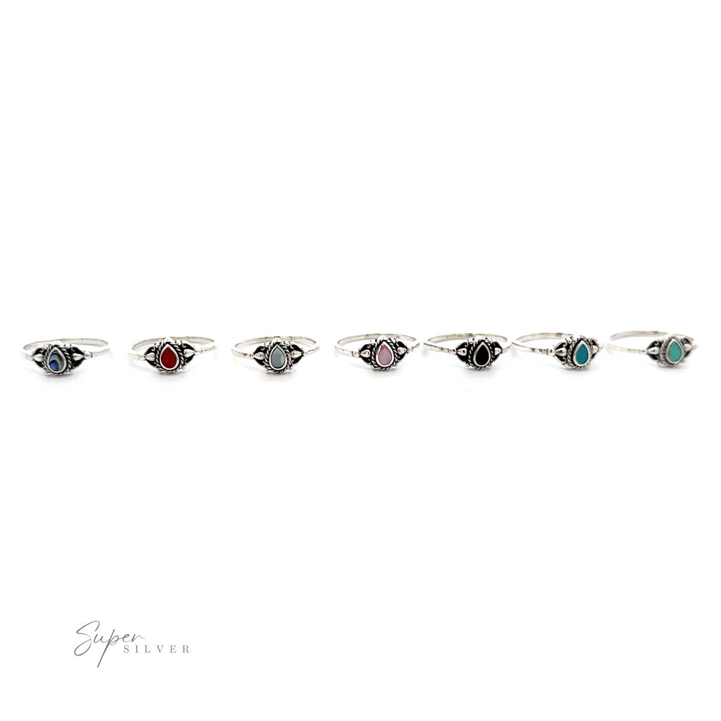 
                  
                    A row of Delicate Teardrop Inlay Stone Rings with turquoise set in sterling silver.
                  
                