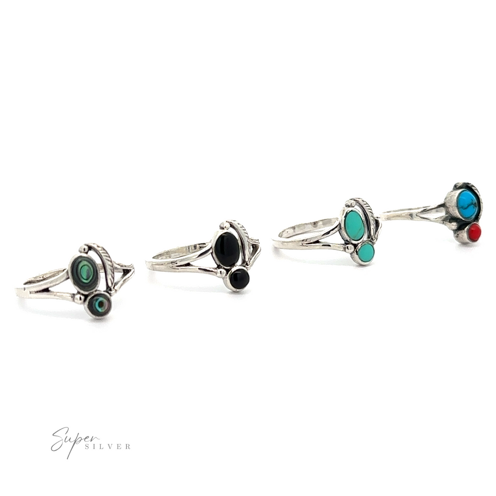
                  
                    Four Stone and Feather Rings with inlaid turquoise stones.
                  
                