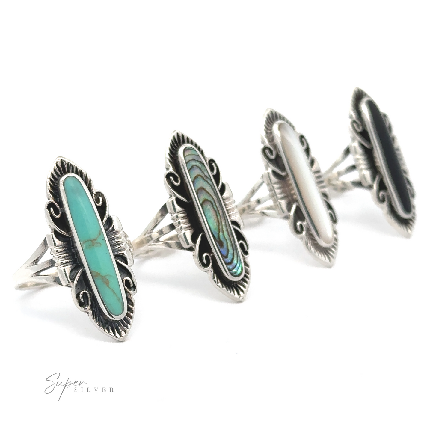 Four Elegant Southwest Inspired Rings with Inlaid Stone, featuring a Southwestern-inspired design.