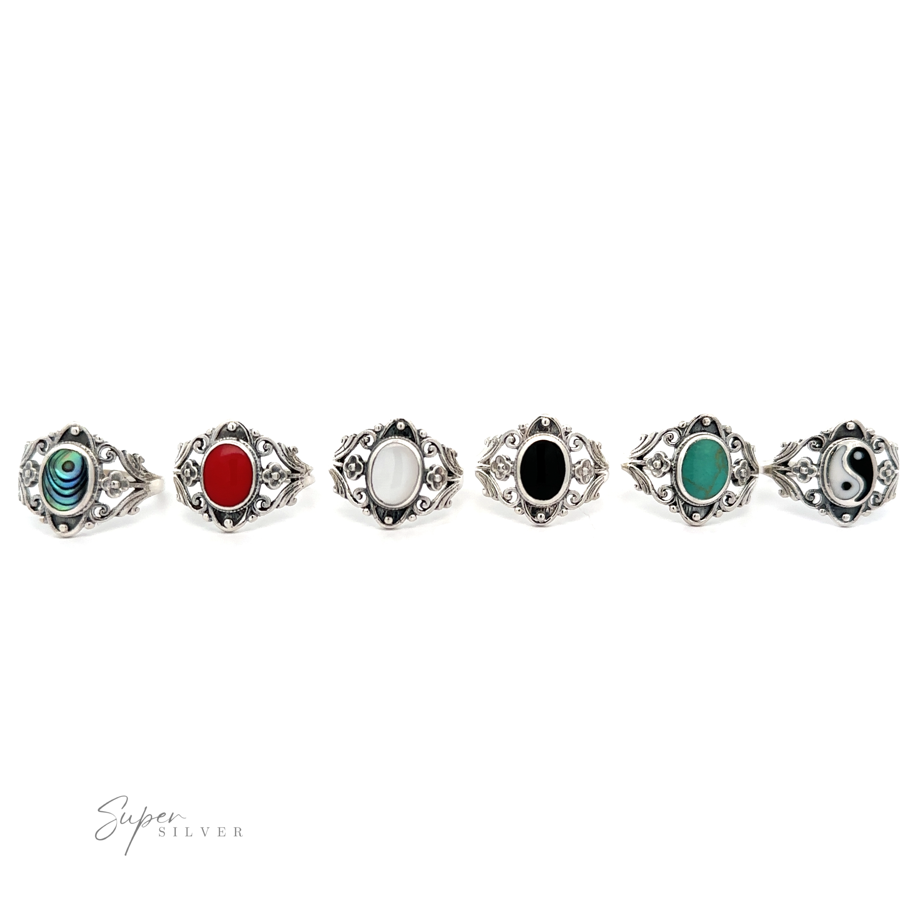 A row of Floral Filigree Inlay Stone rings in different colors, including turquoise.