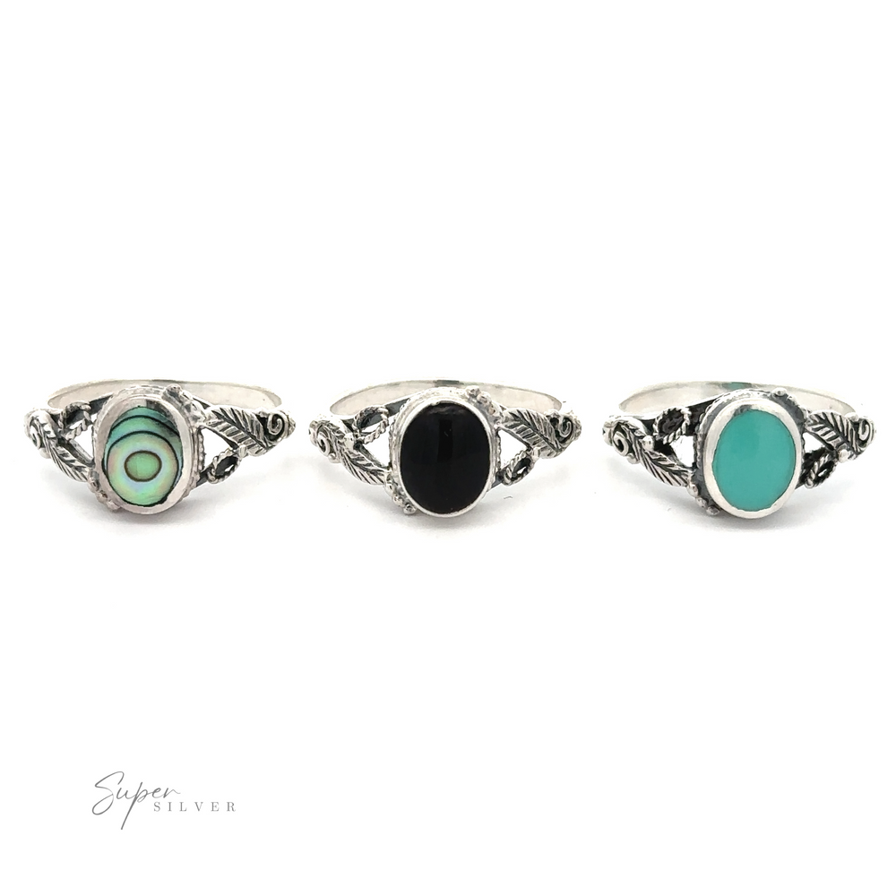 
                  
                    Three Beautiful Oval Stone Rings with Leaf Design, two with black stones and one with turquoise.
                  
                