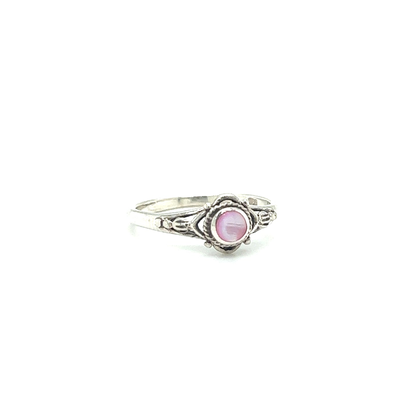 
                  
                    A captivating Dainty Inlaid Stone Ring with Subtle Flower Setting from Super Silver, resting on a white background.
                  
                