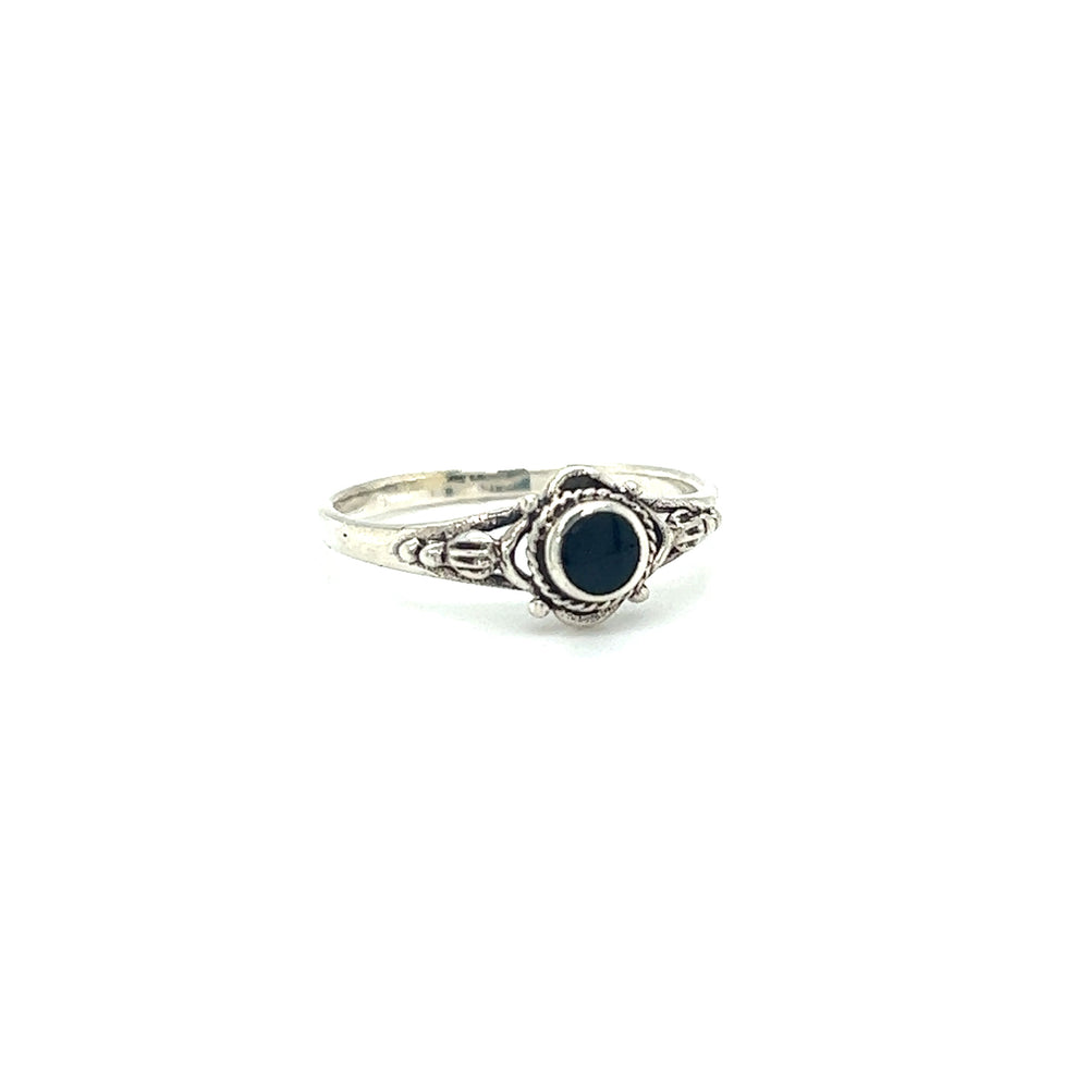 
                  
                    A Super Silver Dainty Inlaid Stone Ring with Subtle Flower Setting, with a captivating allure, featuring a tiny inlaid black stone.
                  
                