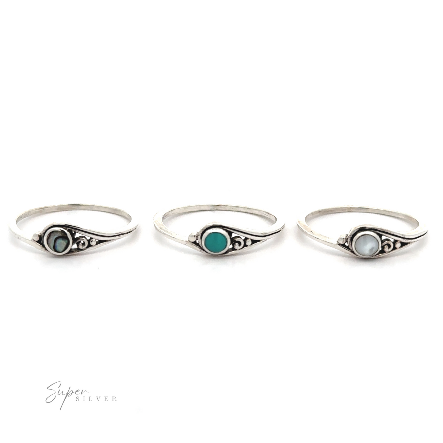 
                  
                    Three Delicate Inlay Stone Rings with Small Swirl Design.
                  
                