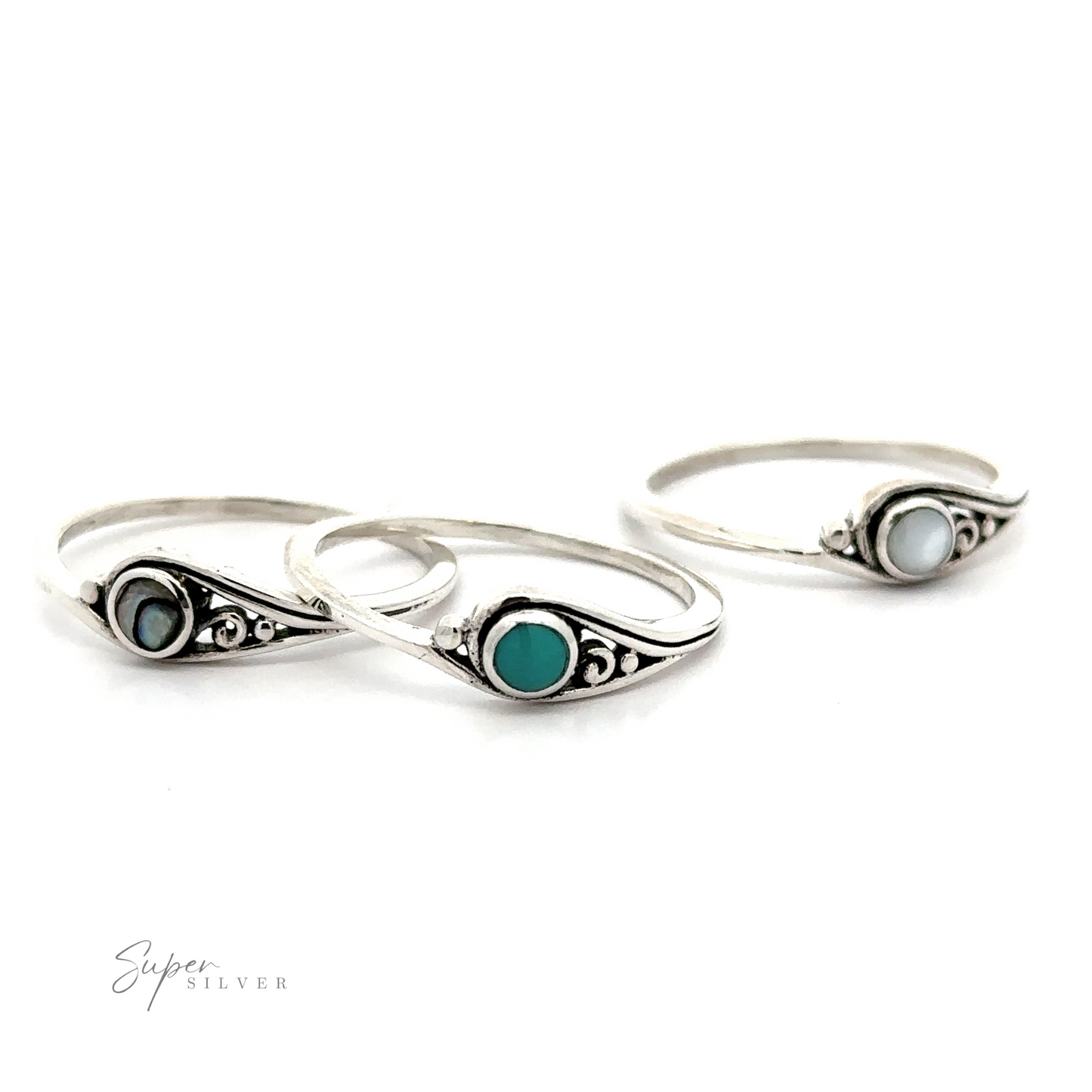 Three Delicate Inlay Stone Rings with Small Swirl Design in sterling silver.