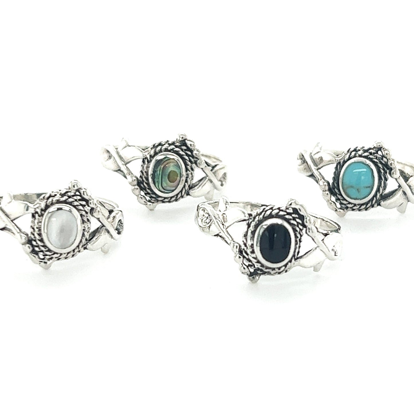 Four silver rings with Decorated Freeform Inlay Stone Rings, boasting a Bali boho vibe.