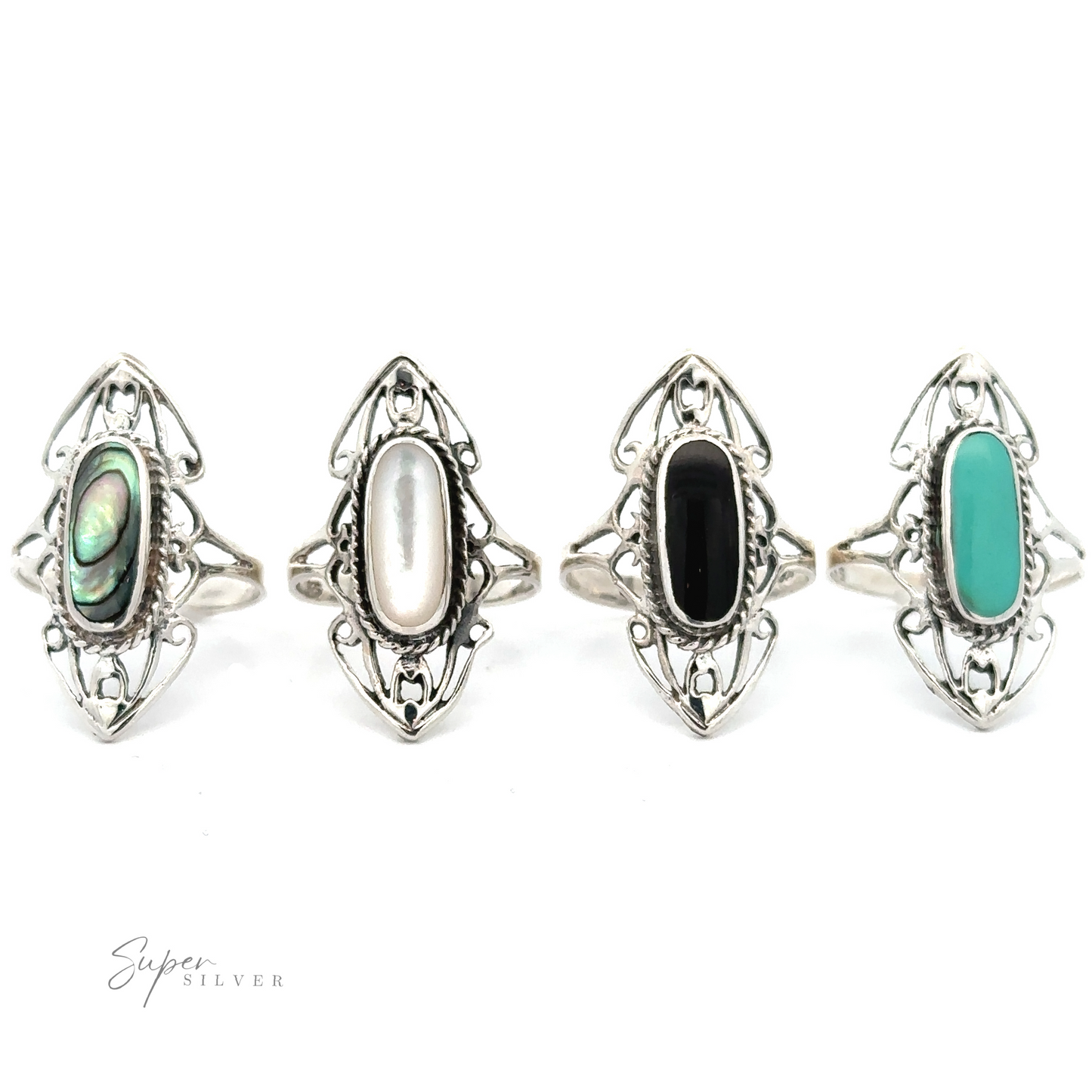 Four sterling silver rings with different colored gemstones displayed side by side, one featuring an Elongated Filigree Ring With Oval Inlaid Stone that adds a touch of boho chic.