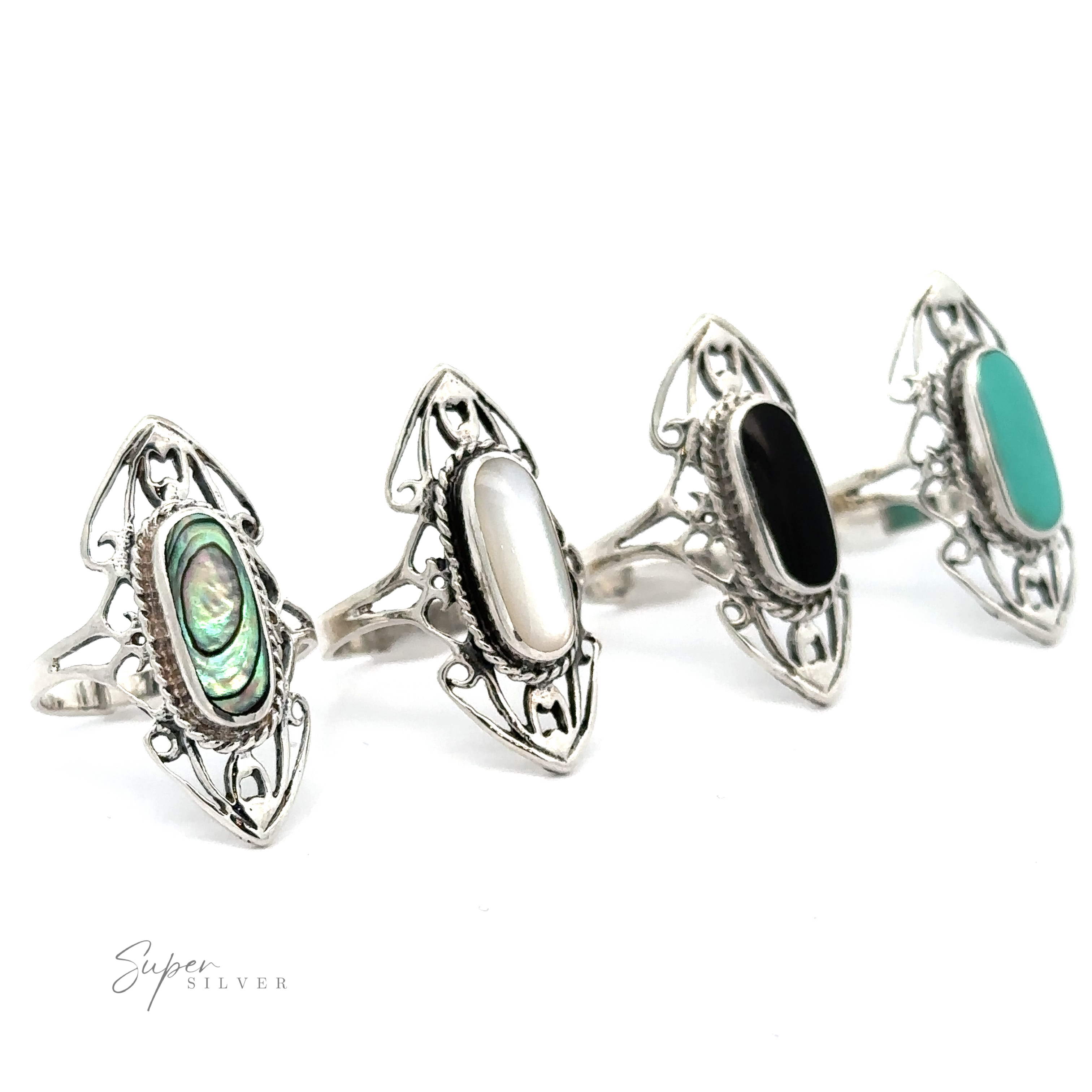 Three Elongated Filigree Rings With Oval Inlaid Stones showcased against a white background, including an open filigree design for a boho chic look.