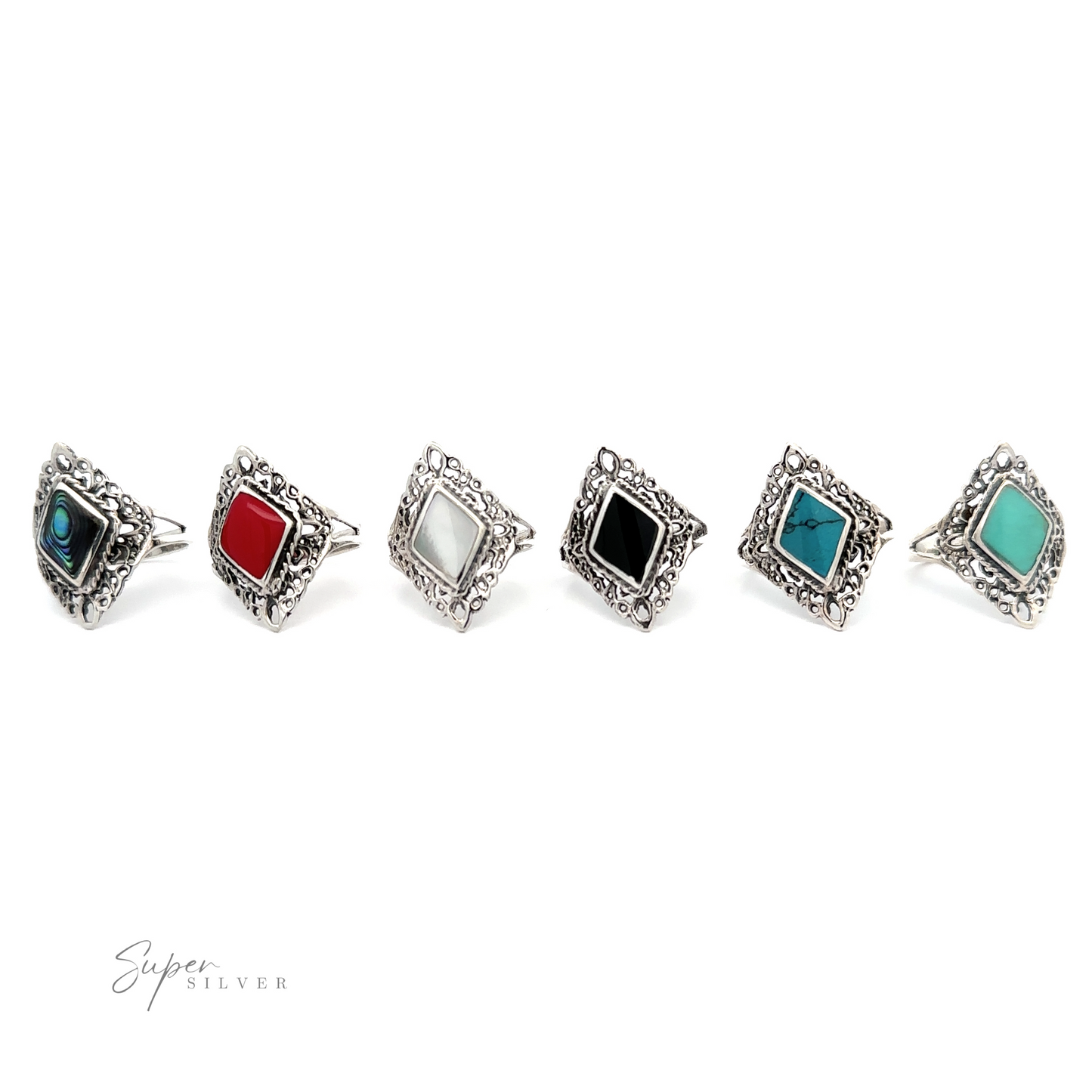 
                  
                    A row of Diamond Shaped Filigree Rings with Inlaid Stones in different colors.
                  
                