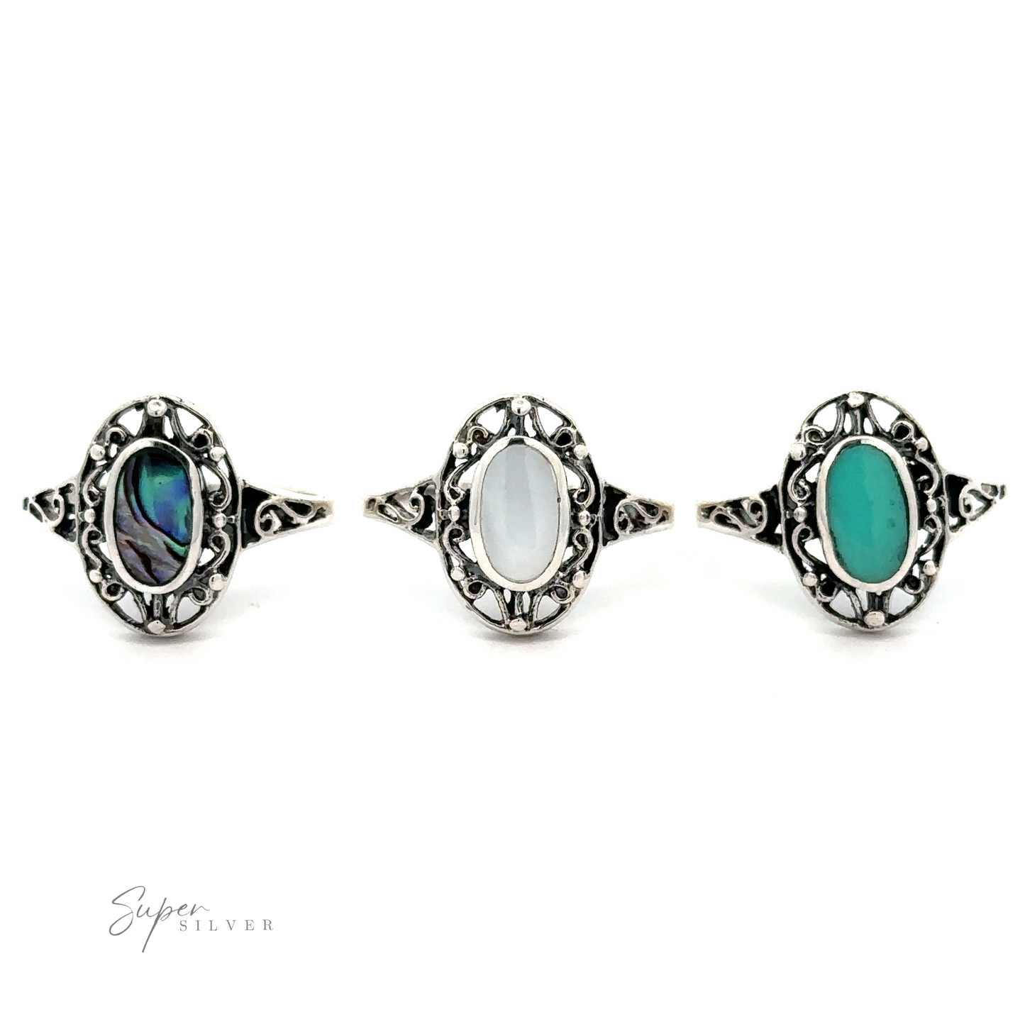 
                  
                    Three sterling silver rings with Oval Inlay Stone with Swirl Filigree Border.
                  
                