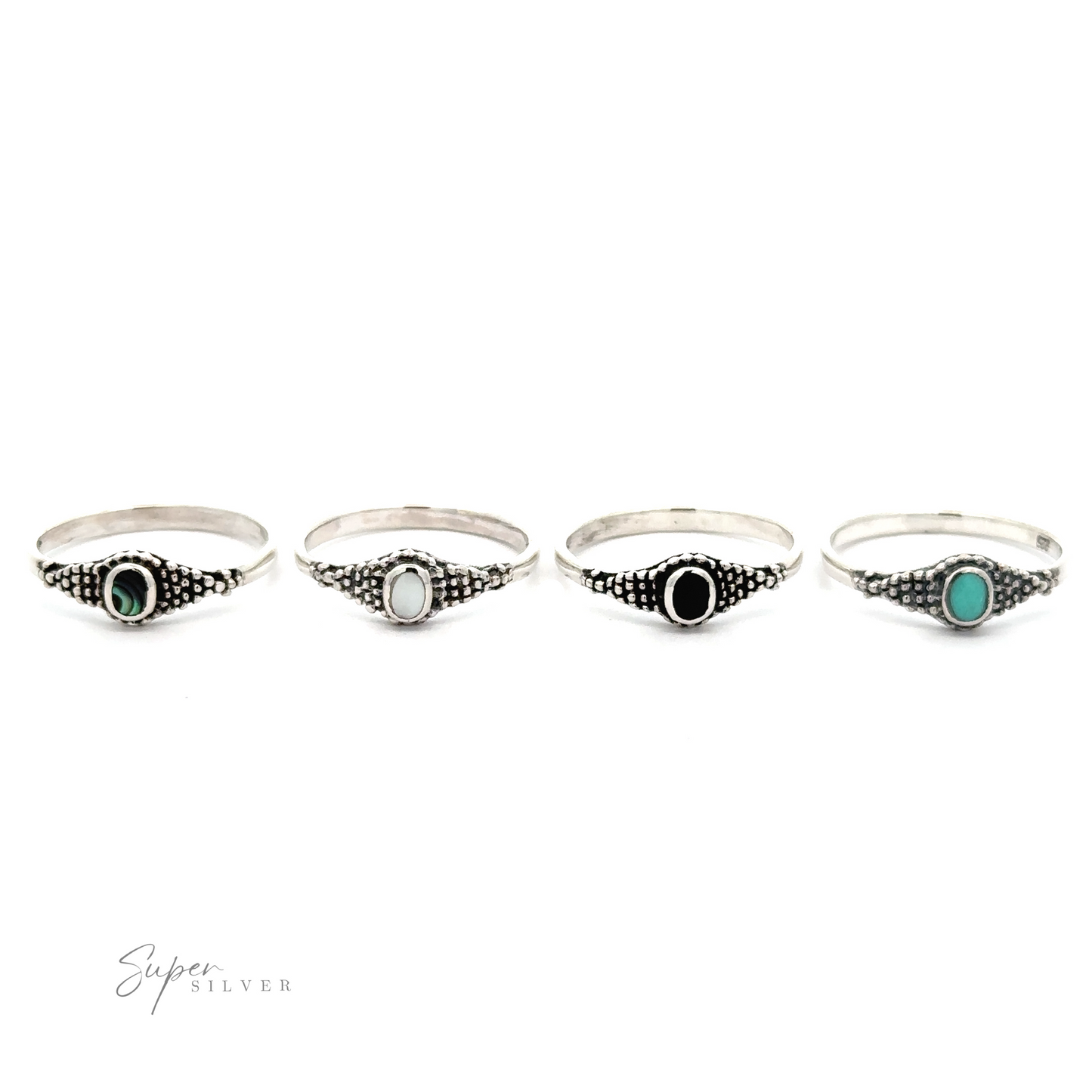 
                  
                    A set of four Dainty Inlaid Rings with Beaded Texture.
                  
                