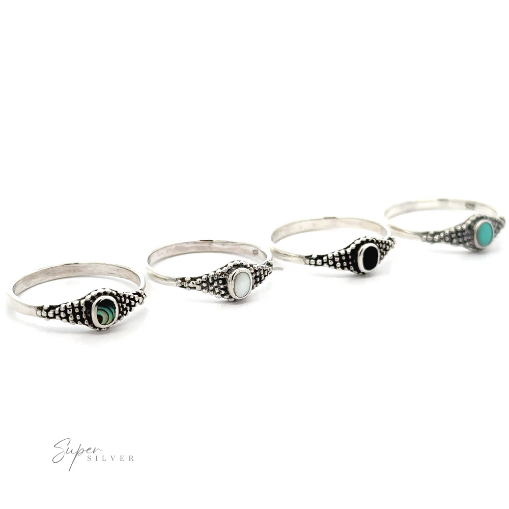 Four Dainty Inlaid Rings with Beaded Texture in a Bali-style beading design.