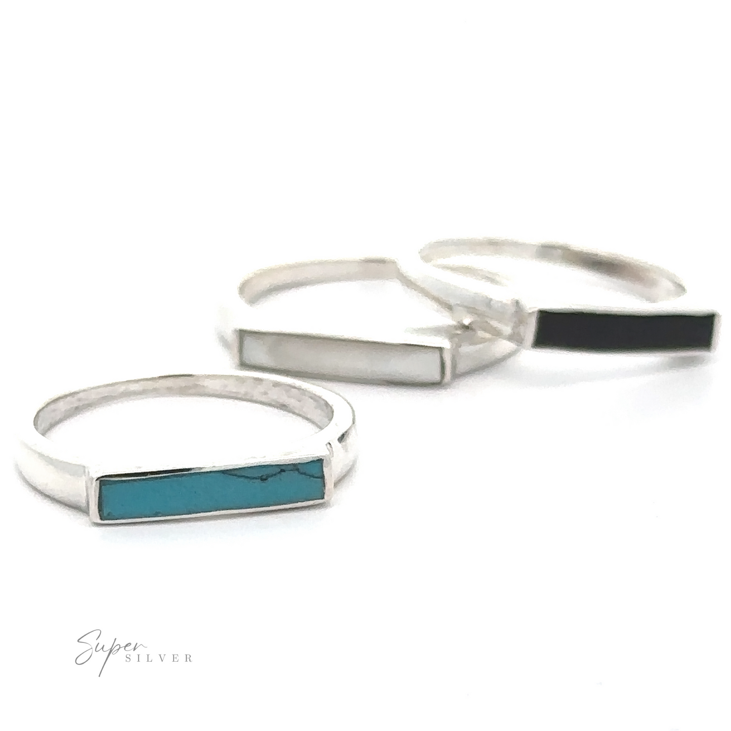 Three Inlay Stone Rectangle Signet Rings with sleek inlaid stone rectangles of different colors displayed against a white background.