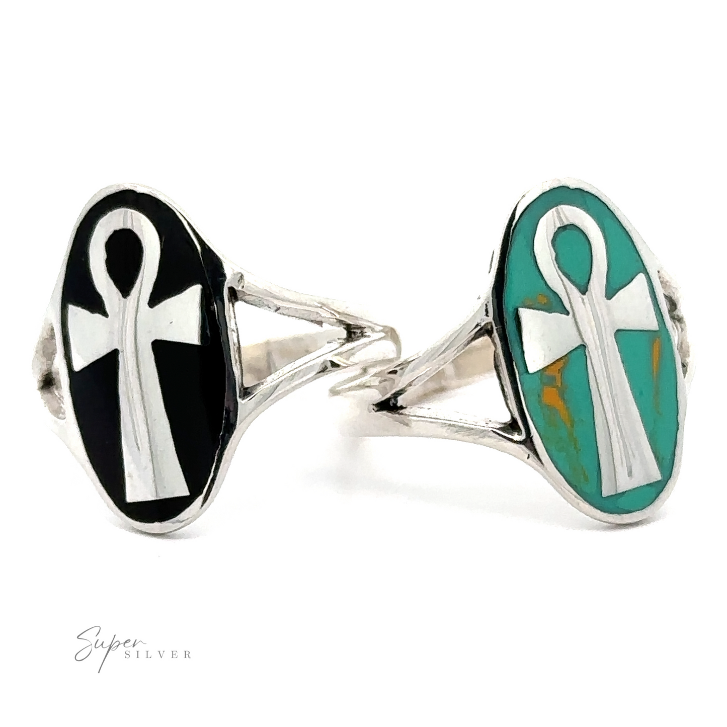 An Ankh ring with a cross and turquoise stones, made of sterling silver.