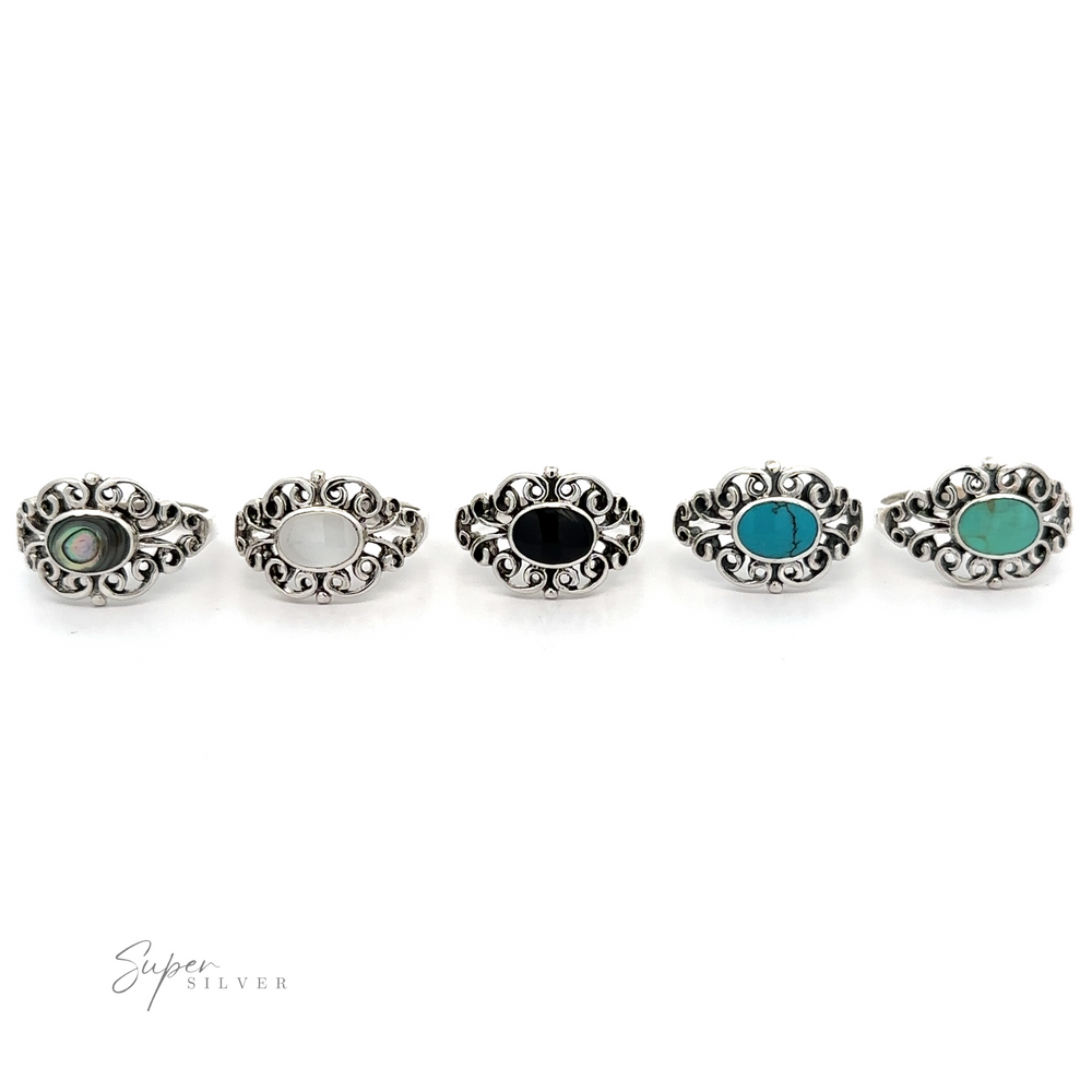 
                  
                    A set of five Victorian Filigree Inlay Stone Rings with vintage turquoise stones.
                  
                