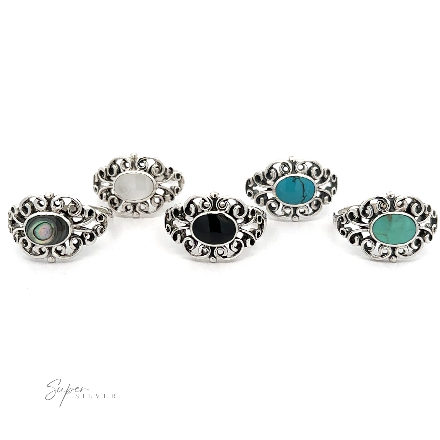 
                  
                    A set of four elegant Victorian Filigree Inlay Stone Rings with timeless colored stones.
                  
                