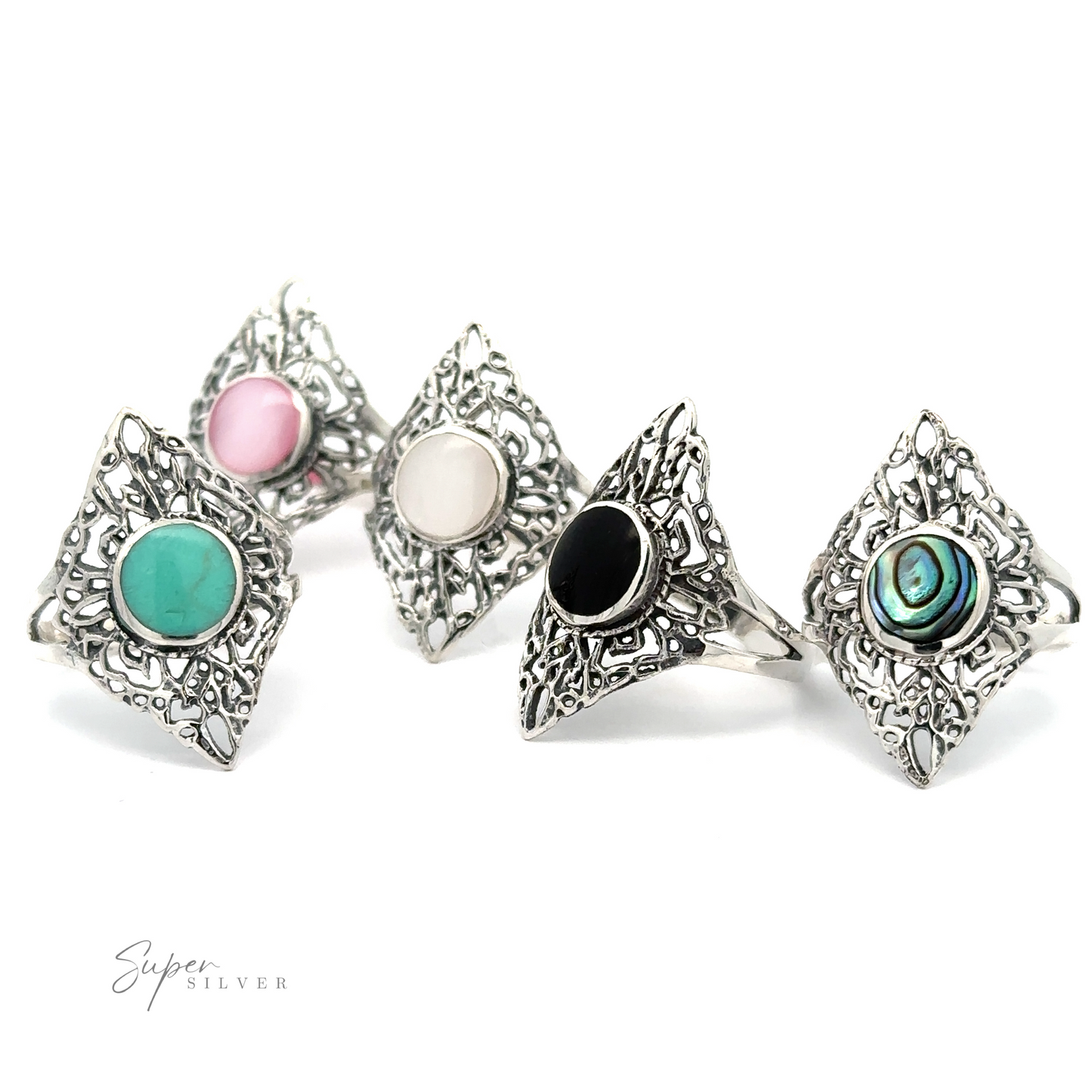 A selection of Diamond Shaped Filigree Rings With Round Inlaid Stones in various hues.