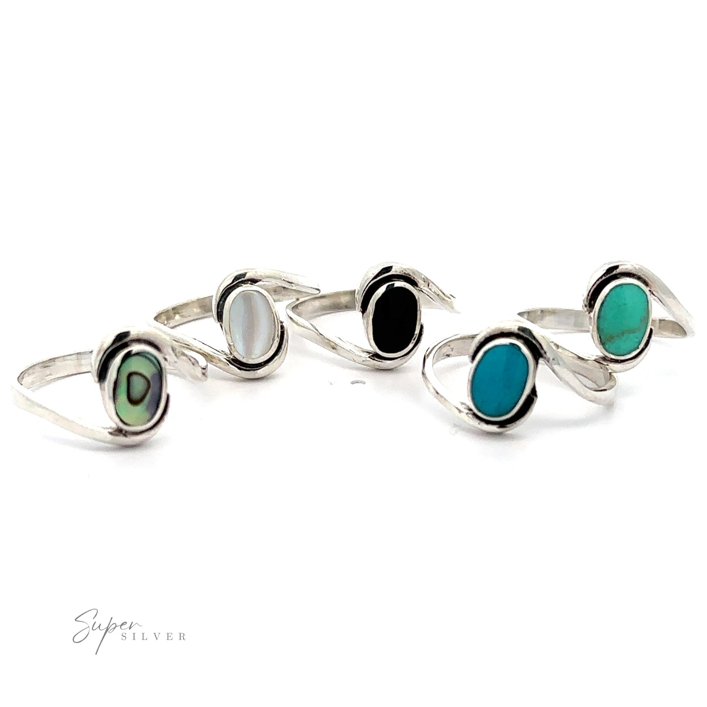 A collection of four exquisite Simple Freeform Rings with Oval Inlaid Stones accents.