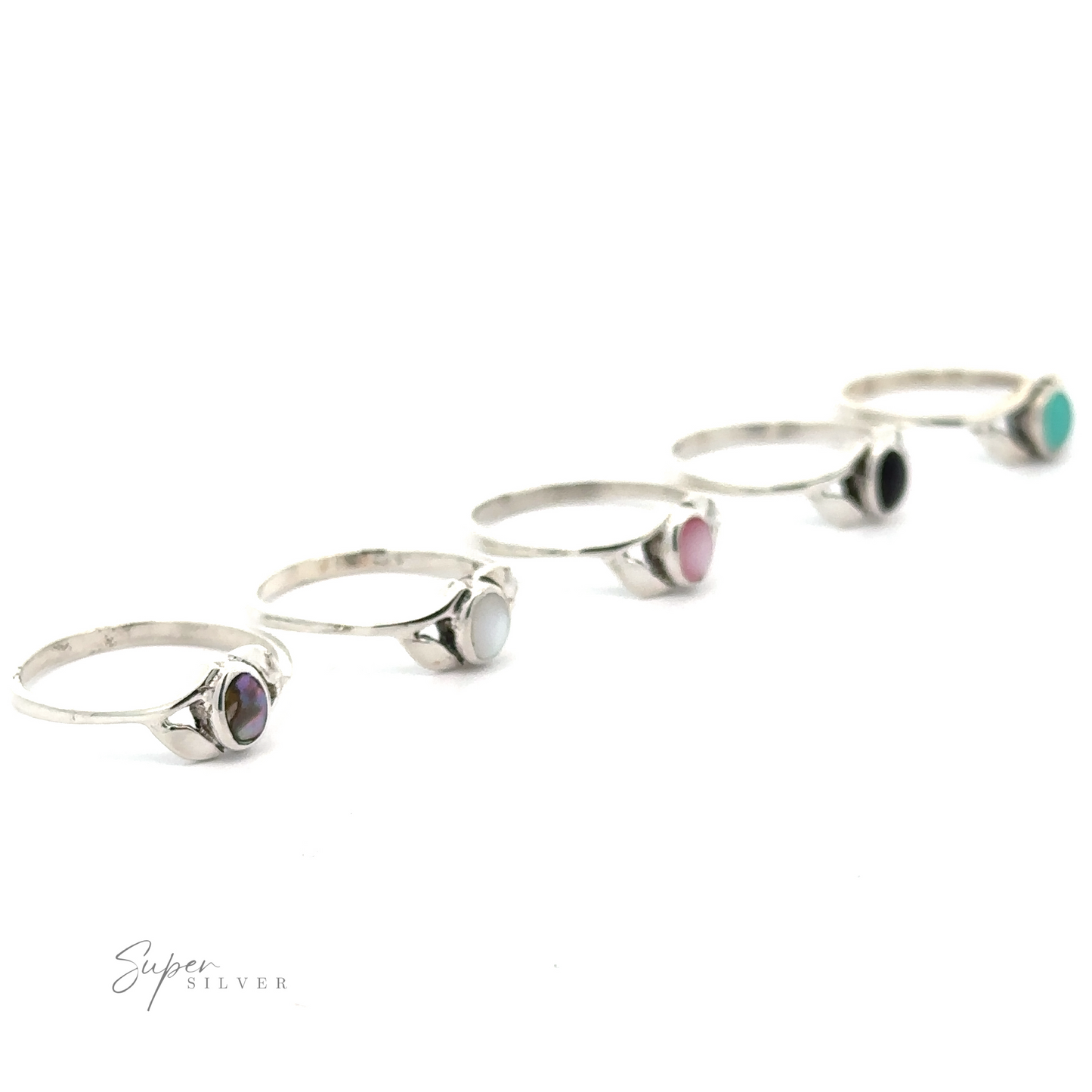 A collection of five Dainty Oval Stone Rings with Leaf Accents in various colors, including mother of pearl, arranged in a diagonal line on a white background.
