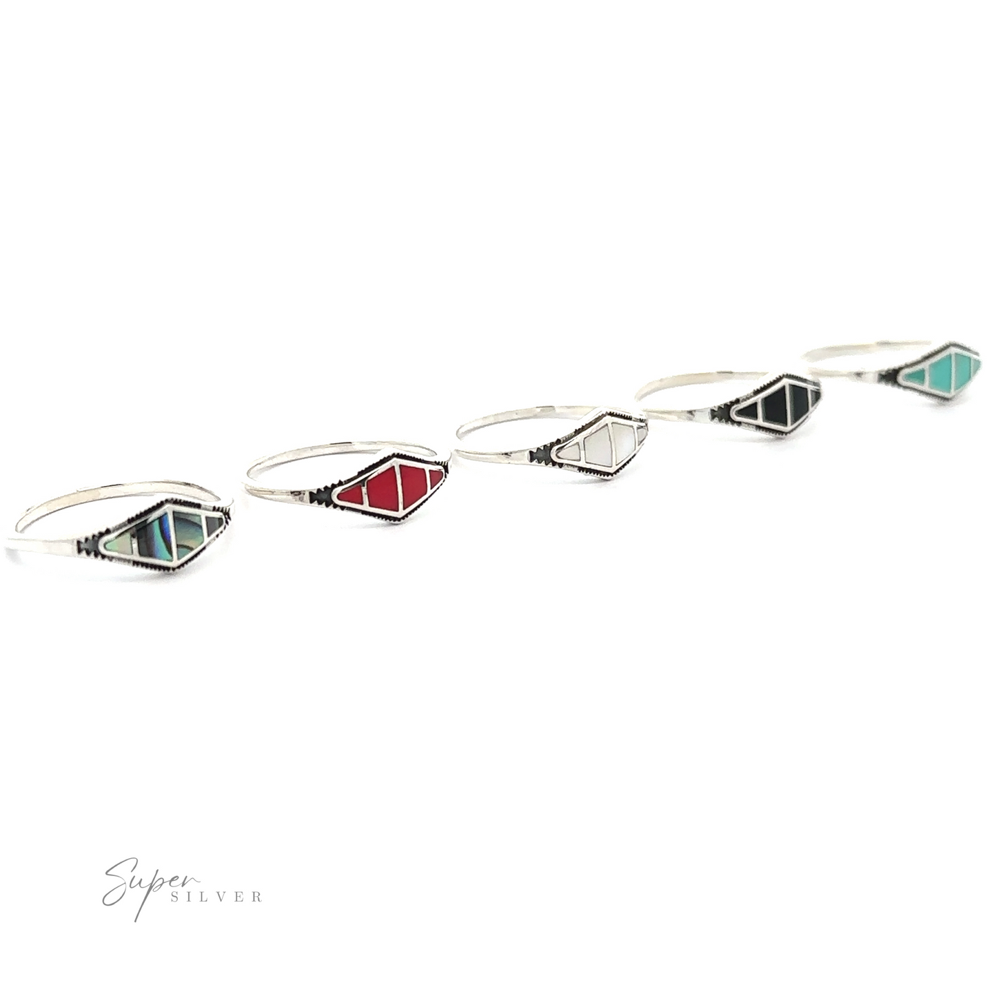 A row of Diamond Shape Sectioned Stone Rings with red, blue, and green stones, embodying unique fashion and contemporary trends.