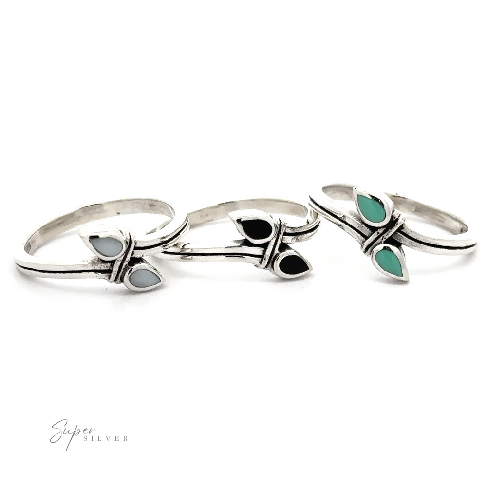 Three sterling silver Inlay Teardrop Rings with turquoise and inlaid stones.