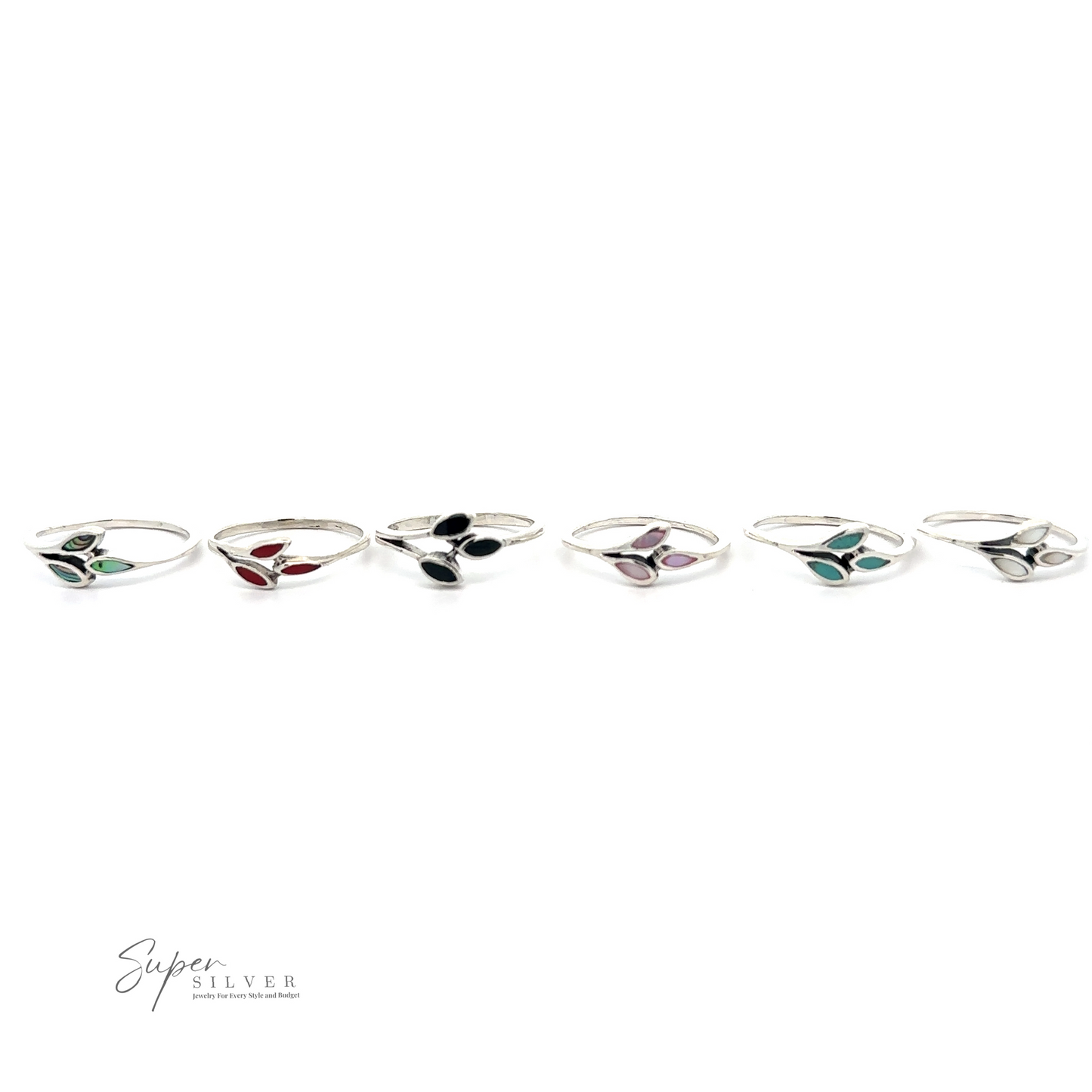 
                  
                    Six Tiny Leaves Rings with Inlaid Stones arranged in a line. The stones are set in pairs and appear in different colors: green, red, black, purple, blue, and green. The minimalist rings feature the logo "Super Silver.
                  
                