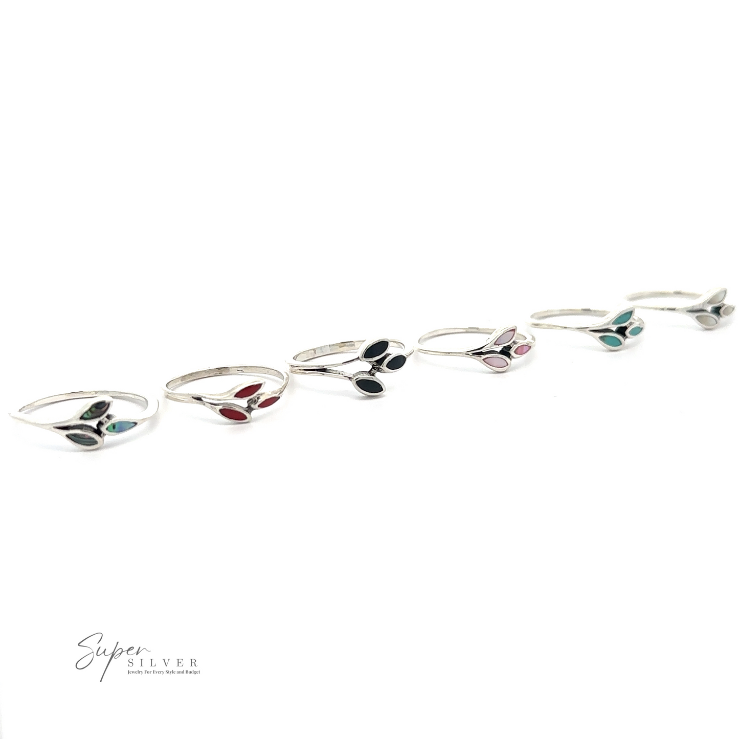 Six Tiny Leaves Rings with Inlaid Stones, each adorned with a different colored stone—blue, red, black, pink, and green—are staged in a line on a white background. The text "Super Silver" graces the bottom left corner. Each minimalist ring features subtle details for a touch of elegance.