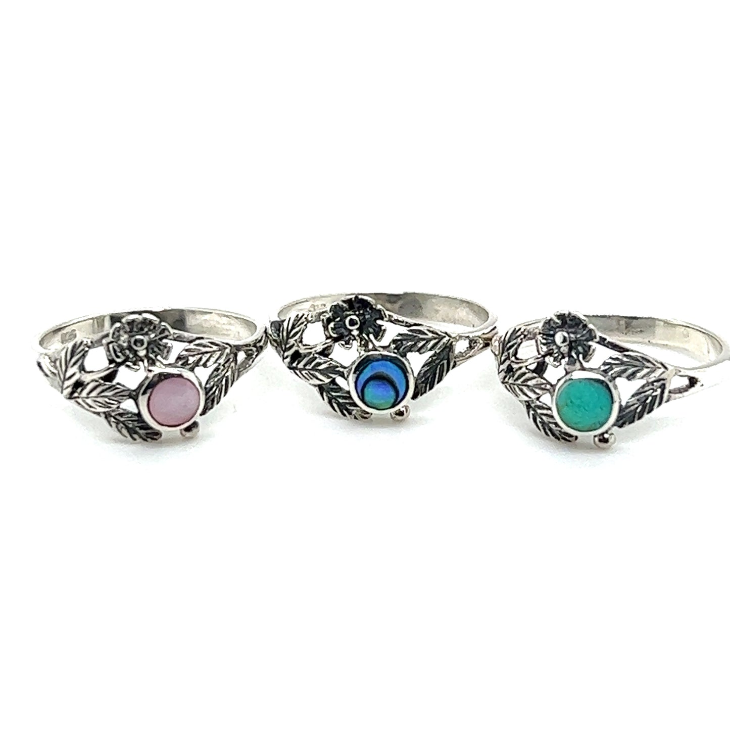 
                  
                    Three vintage-inspired Super Silver Inlaid Stone Rings with colorful dainty flower inlaid stones.
                  
                