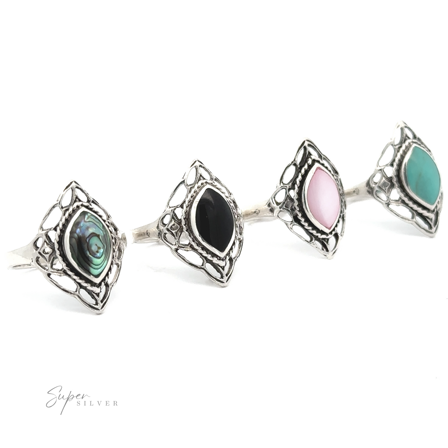 
                  
                    A row of Delicate Marquise Shield Rings with different colors and inlaid stones.
                  
                