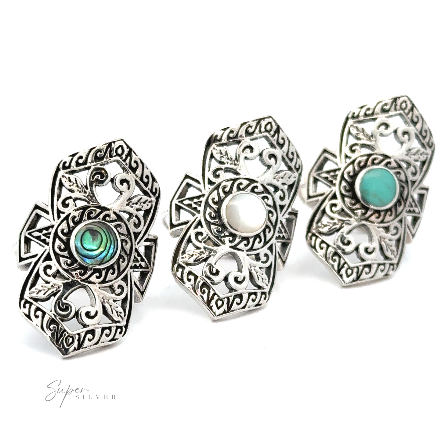 Three elaborate filigree shield rings with turquoise stone accents and pearls.