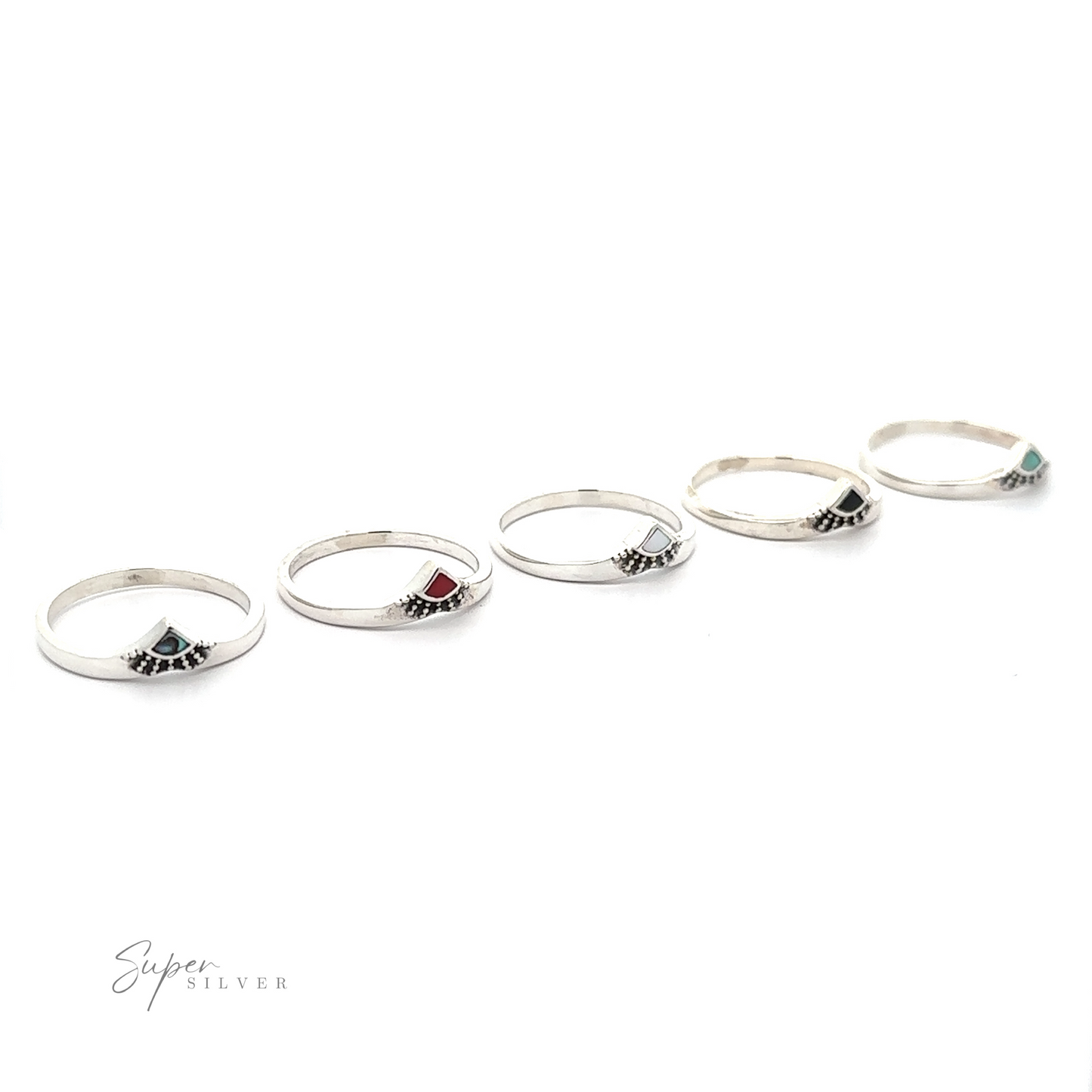 A row of Dainty Chevron Bali Style Inlay Rings with different colored stones, a versatile accessory for free-spirited charm.
