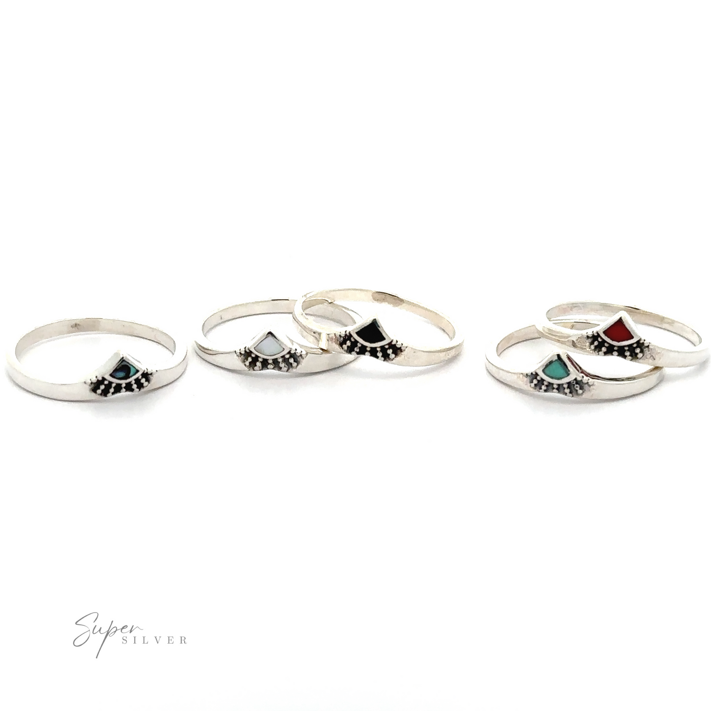 A set of four Dainty Chevron Bali Style Inlay Rings with abalone and mother of pearl stones.