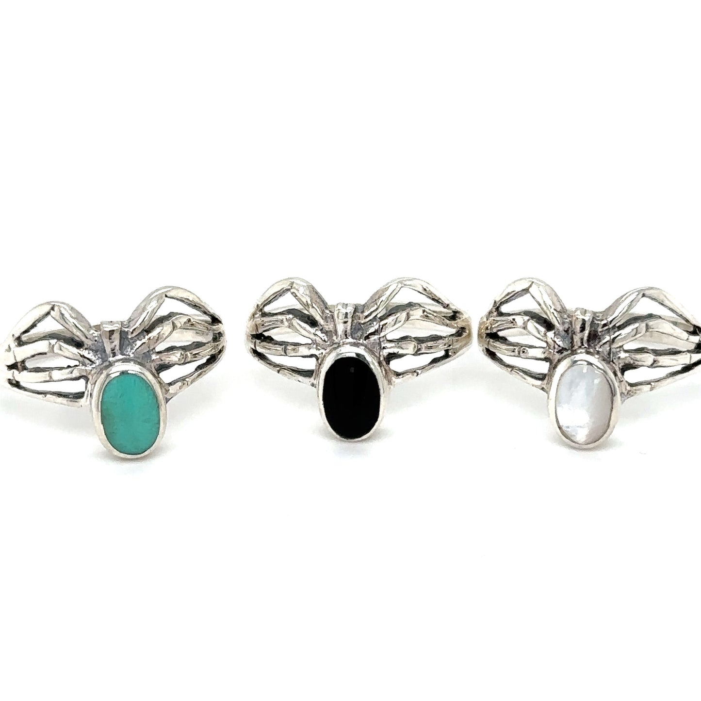 Three Super Silver Inlay Stone Spider rings with turquoise and black stones.