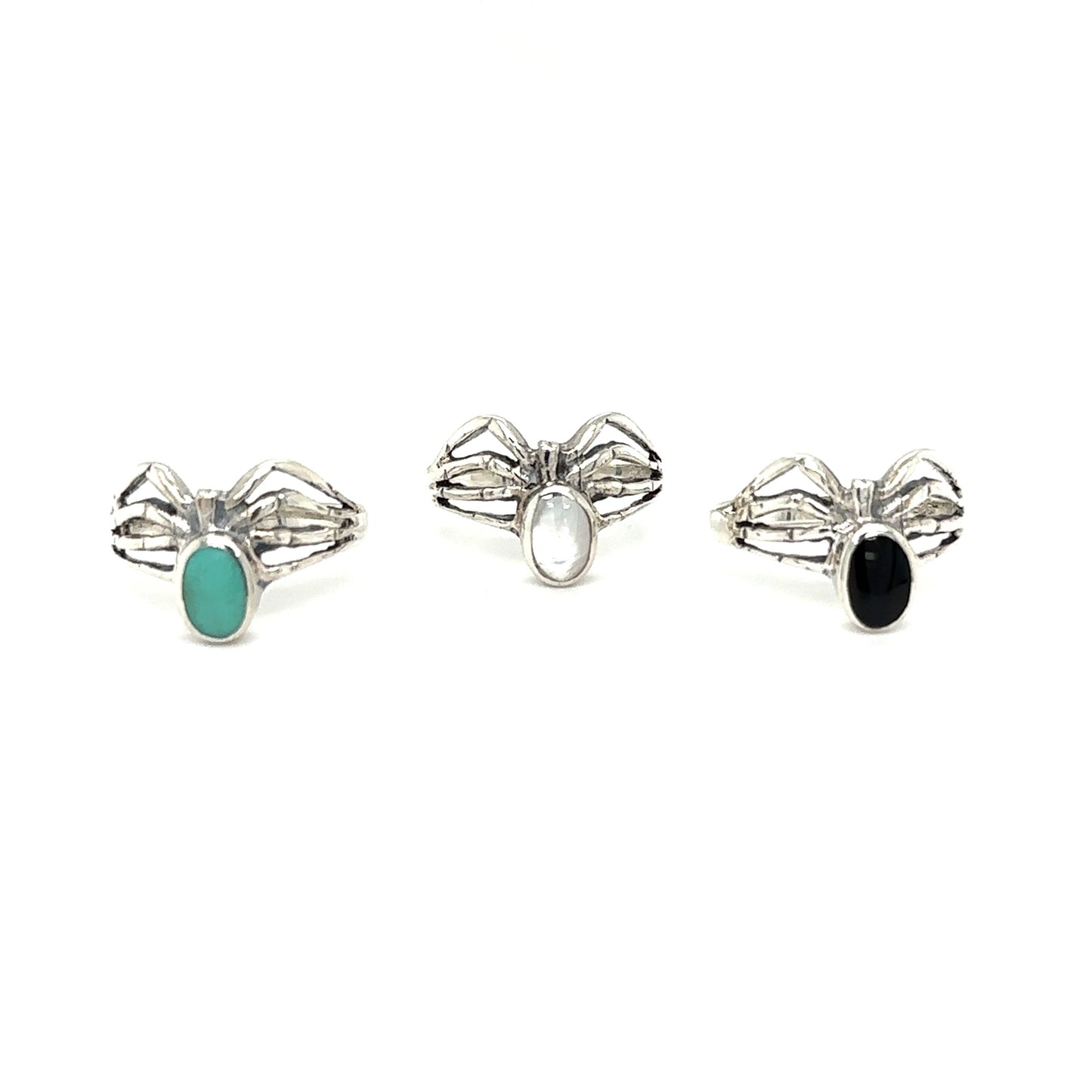 
                  
                    A set of three Super Silver Inlay Stone Spider Rings with mystical turquoise stones.
                  
                