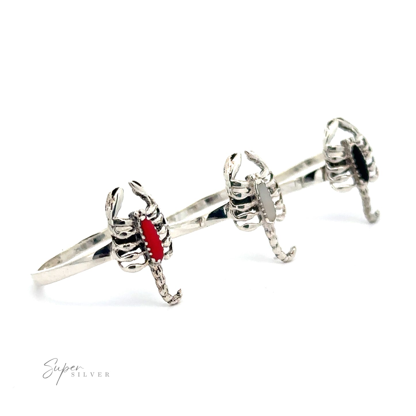 Three Small Scorpion Rings with Inlaid Stone displayed on a white background, with the middle ring featuring a red stone.
