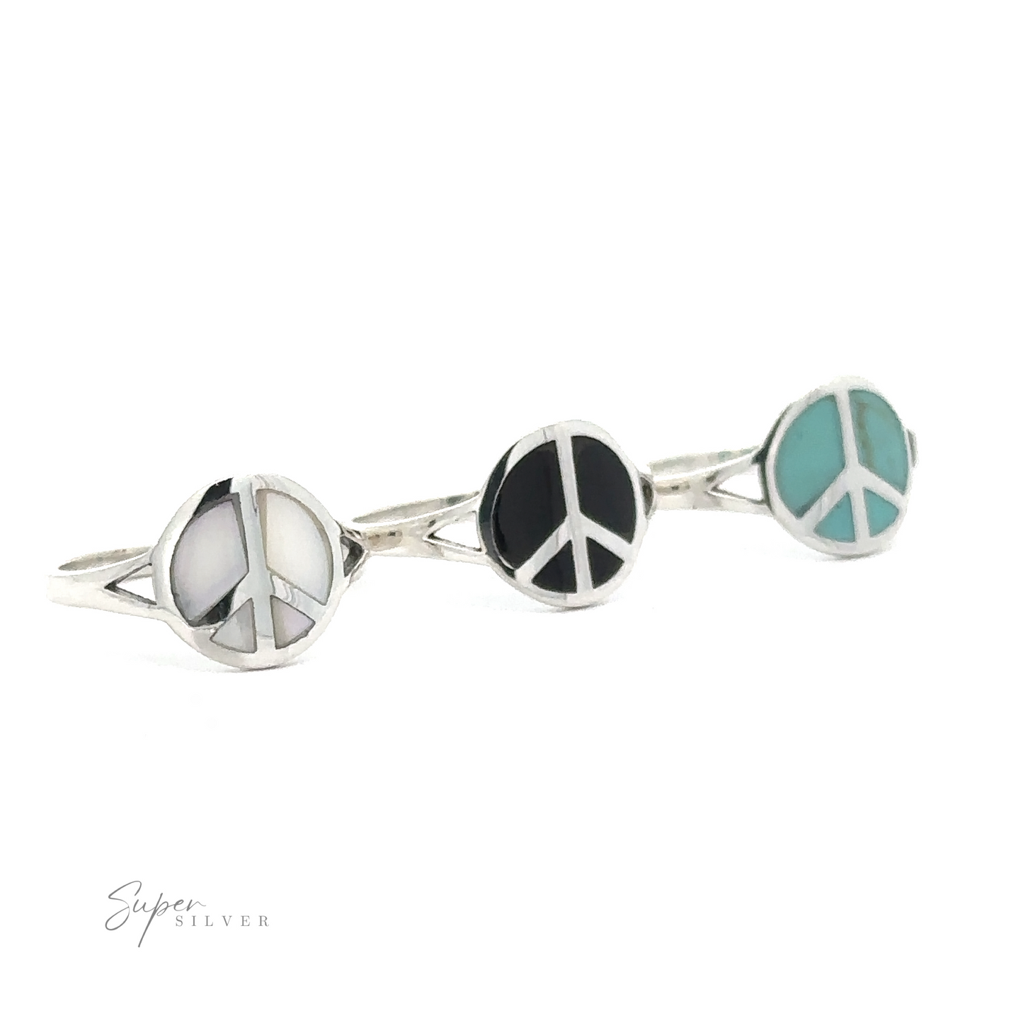 
                  
                    Stone Inlay Peace Sign Ring with circular designs, featuring white, black onyx, and turquoise inlays, photographed against a white background.
                  
                