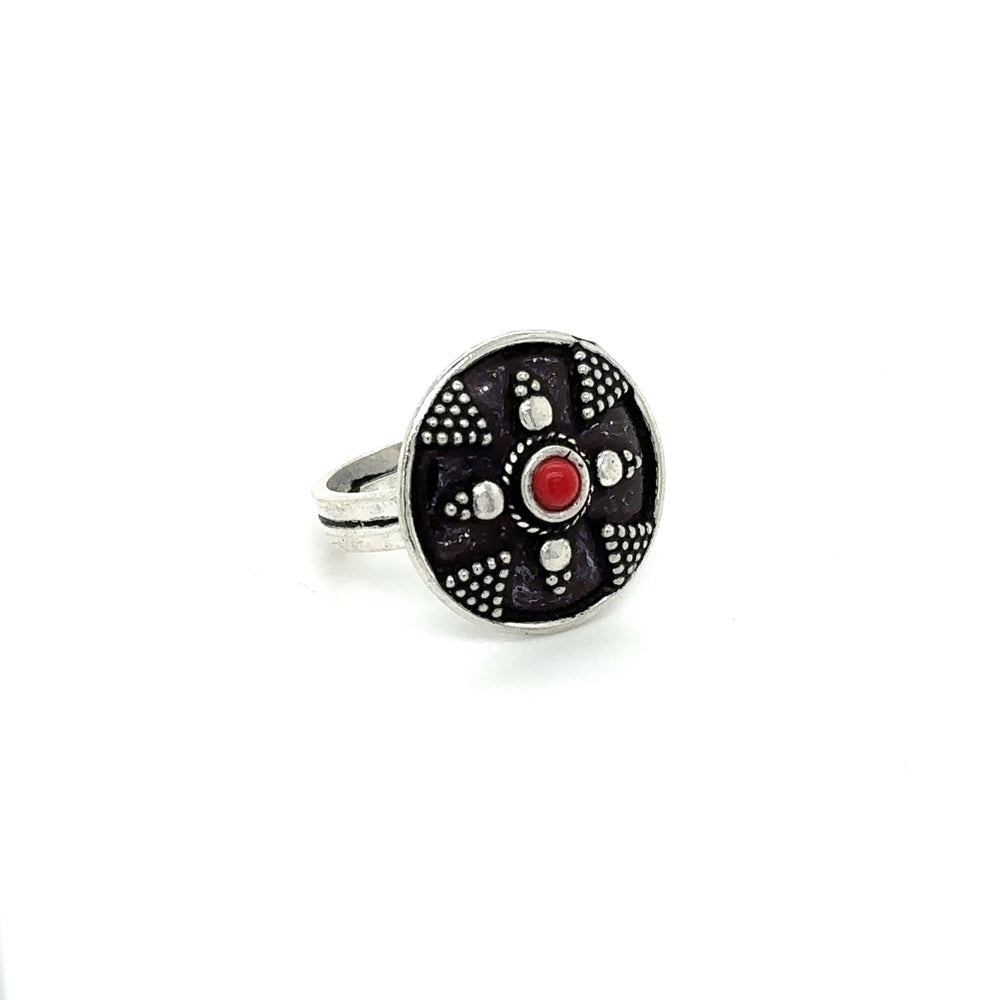 
                  
                    A stunning Tibetan-style silver ring with a red stone, making it a Tibetan-Style Ring with Small Stones bohemian masterpiece.
                  
                