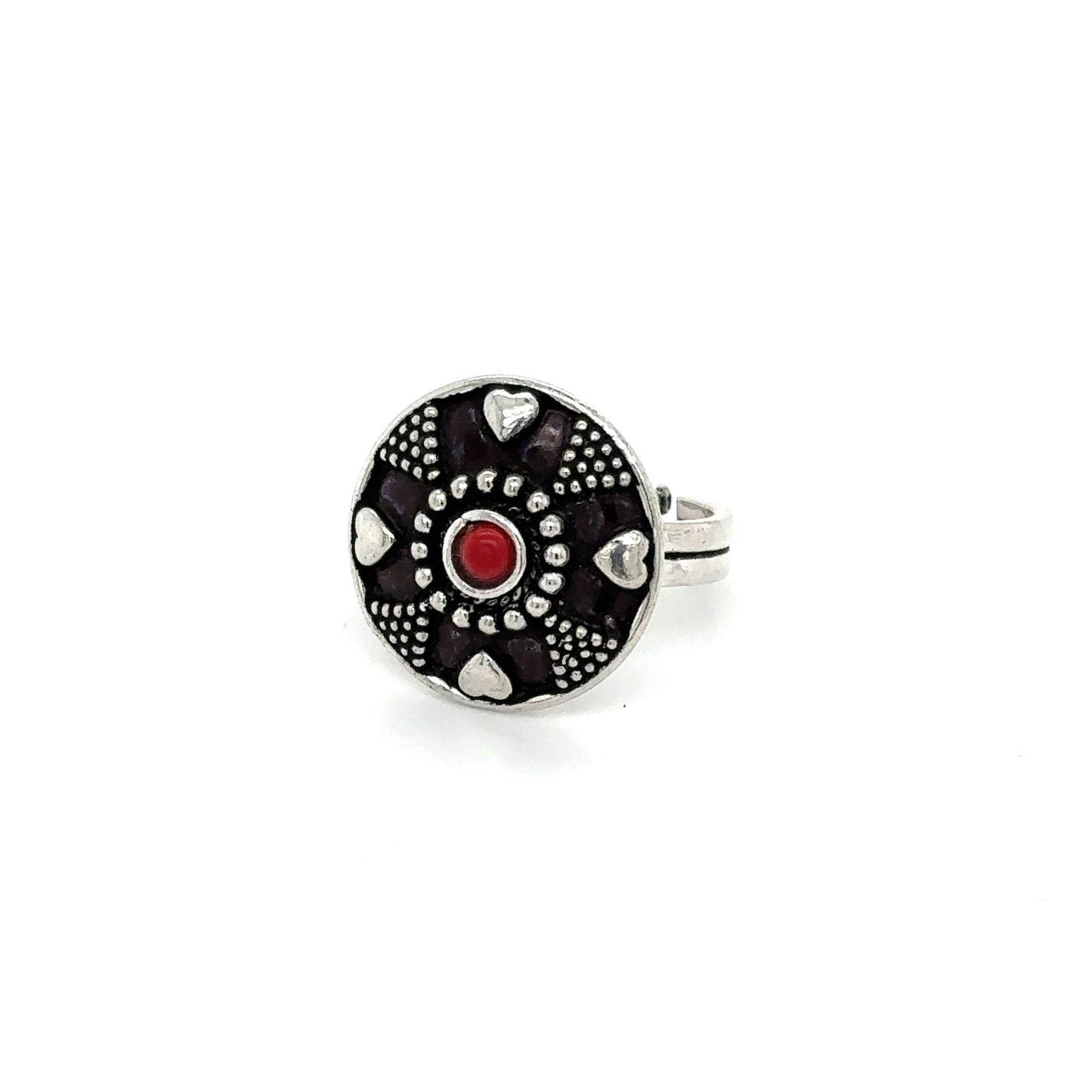 
                  
                    A stunning Tibetan-style ring adorned with a red stone.
                  
                
