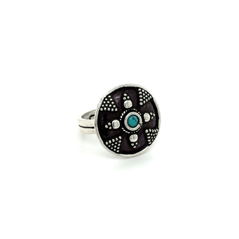 
                  
                    A stunning Tibetan-Style Rings with Small Stones with a turquoise stone.
                  
                