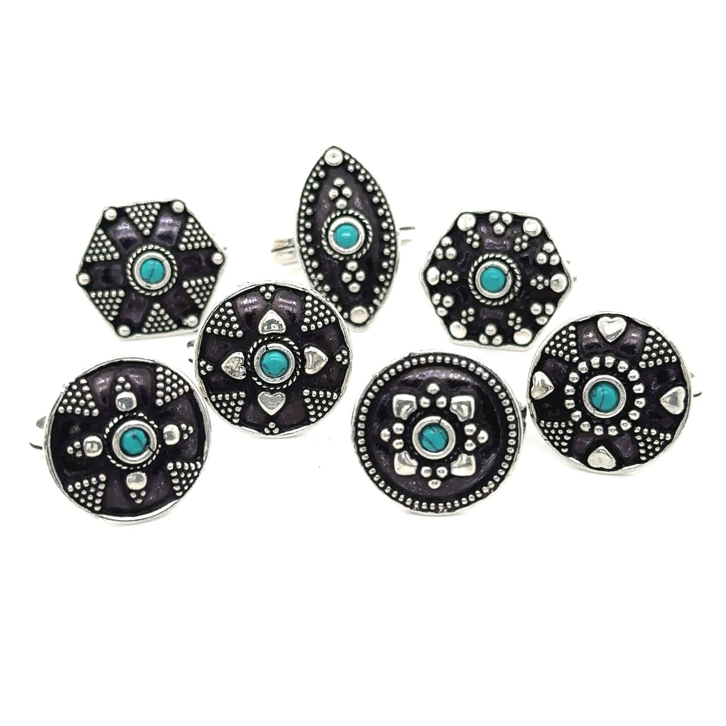
                  
                    A bohemian masterpiece of stunning Tibetan-style rings featuring turquoise and black stones, known as the Tibetan-Style Rings with Small Stones.
                  
                