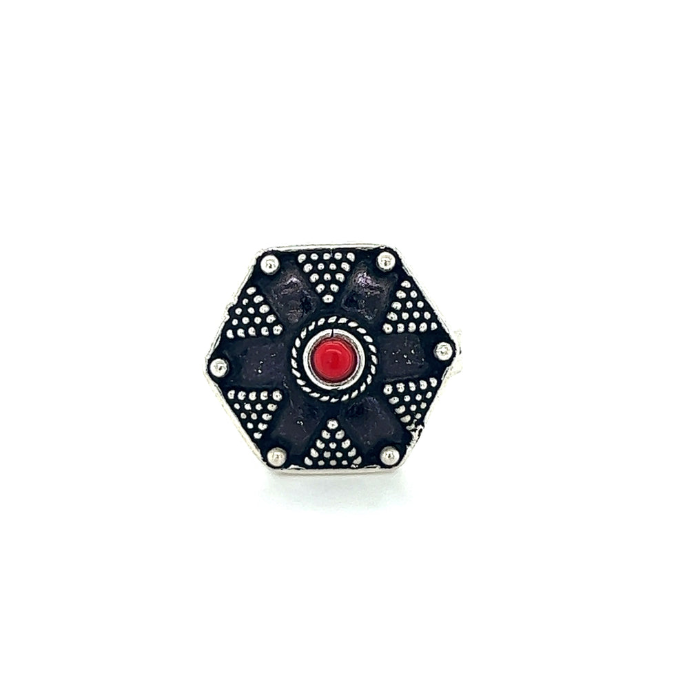 
                  
                    A bohemian masterpiece Tibetan-Style Ring with Small Stones, featuring a black and red color combination and adorned with a vibrant red stone.
                  
                