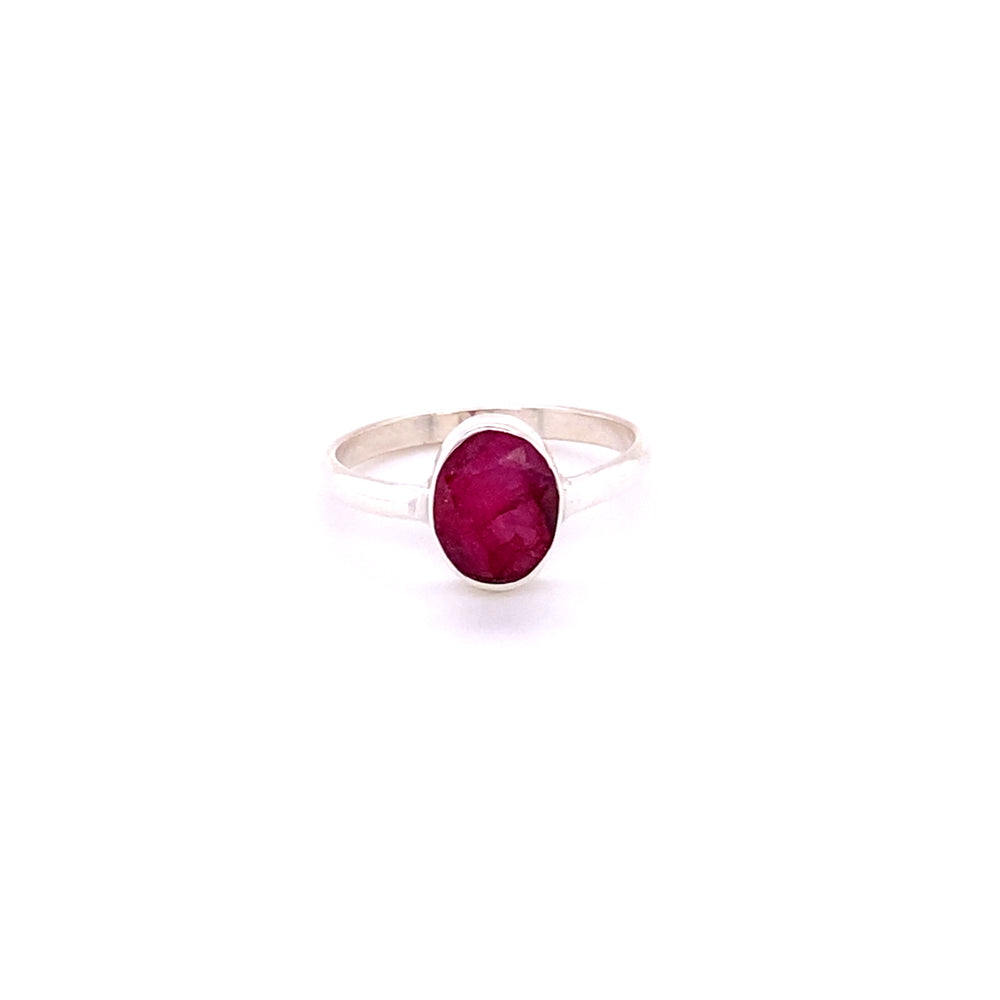 
                  
                    Simple Oval Natural Gemstone Ring with an oval-shaped ruby, centered on a plain white background.
                  
                
